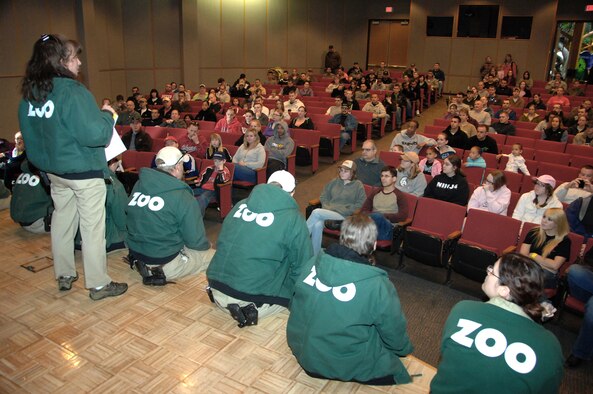 OFFUTT AIR FORCE BASE, Neb. -- Christine Dupre, volunteer coordinator for the Henry Doorly Zoo in Omaha, Neb., assigns Offutt volunteers to work groups May 8 during the zoo's annual clean up day. U.S. Air Force photo by Delanie Stafford
