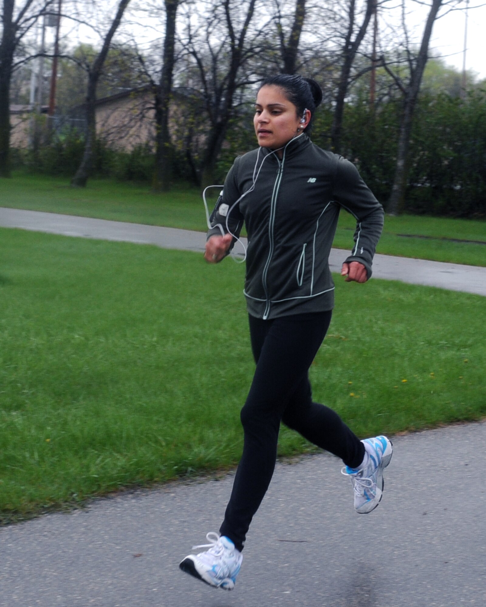 Capt. Aarti Puri, 319th Air Refueling Wing, participated in the Cinco de Mayo 5k run May 5 on Grand Forks Air Force Base, N.D.  Captain Puri finished first out of the female participants in the 5K run that was held to promote fitness. (U.S. Air Force photo by Airman 1st Class Amber Price)