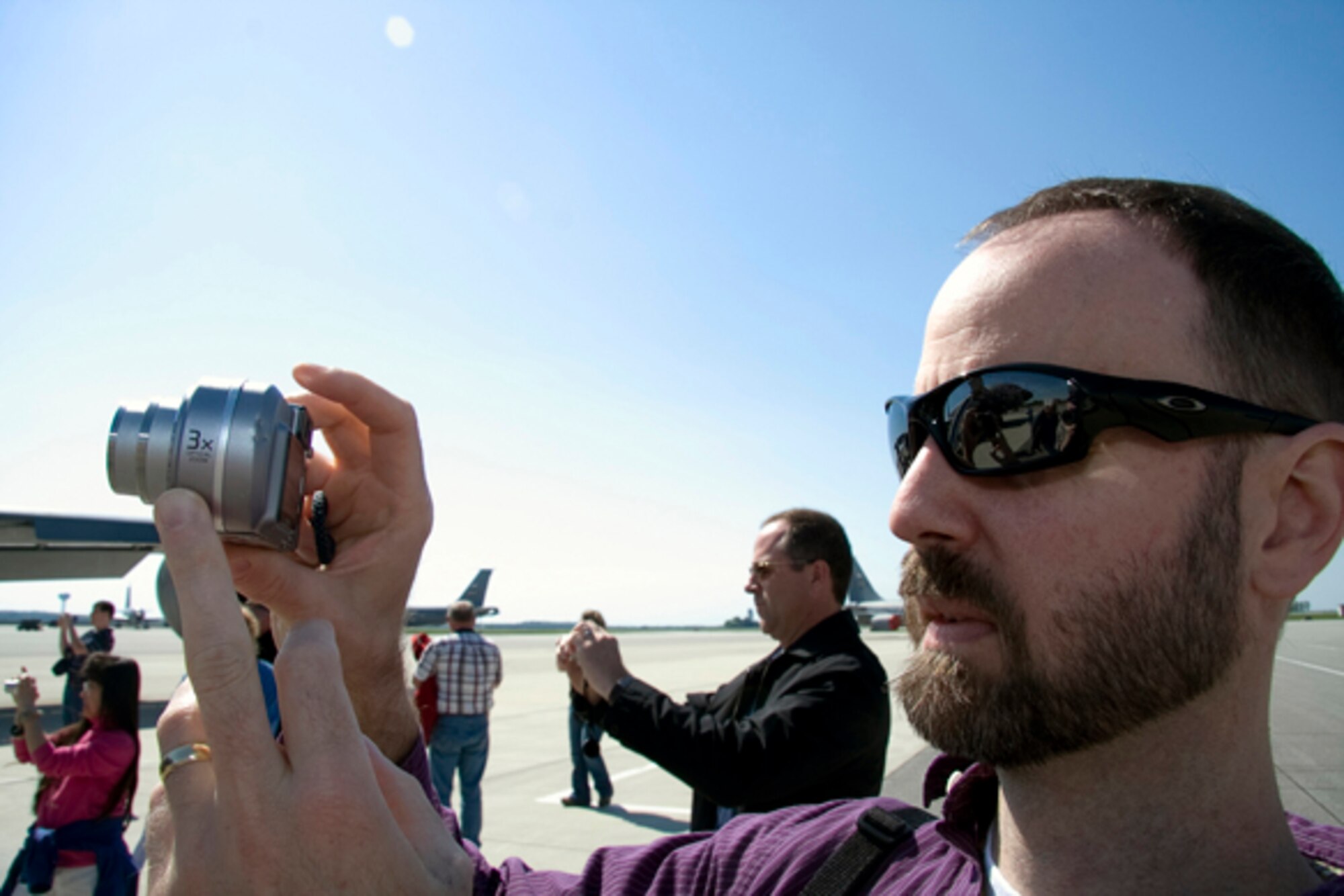 GRISSOM AIR RESERVE BASE, Ind. -- Aaron Kosberg, along with other civic leaders, takes photos of a KC-135R Stratotanker prior to an orientation flight. The orientation flight gave the civic leaders a first-hand look at the mission of the 434th Air Refueling Wing. (U.S. Air Force photo/Tech. Sgt. Mark R. W. Orders-Woempner)