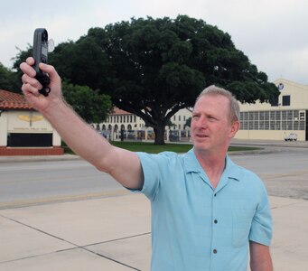 Terry Roberts, a meteorologist technician with the 12th Operations Support Squadron Weather Operations Flight at Randolph Air Force Base, TX, uses a Kestrel Device to verify air temperature, dew point and wind velocity, as part of the weather forecasting information provided to pilots prior to flying a sortie.  (U.S. Air force Photo By Don Lindsey)