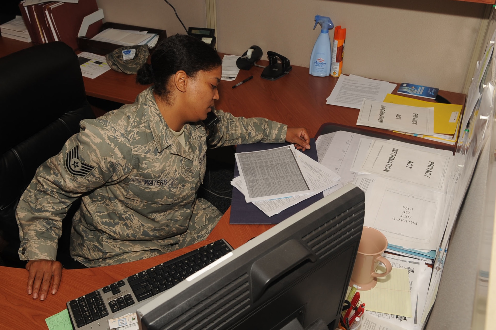 LANGLEY AIR FORCE BASE, Va. -- Tech. Sgt. Kimberly Waters, 633d Force Support Squadron noncommissioned officer in charge of promotions, reviews promotion package files May 6. Waters has served as a personnelist at Langley for five years, serving at the NCOIC for promotions for the past two years. (U.S. Air Force photo/Staff Sgt. Ashley Hawkins) 