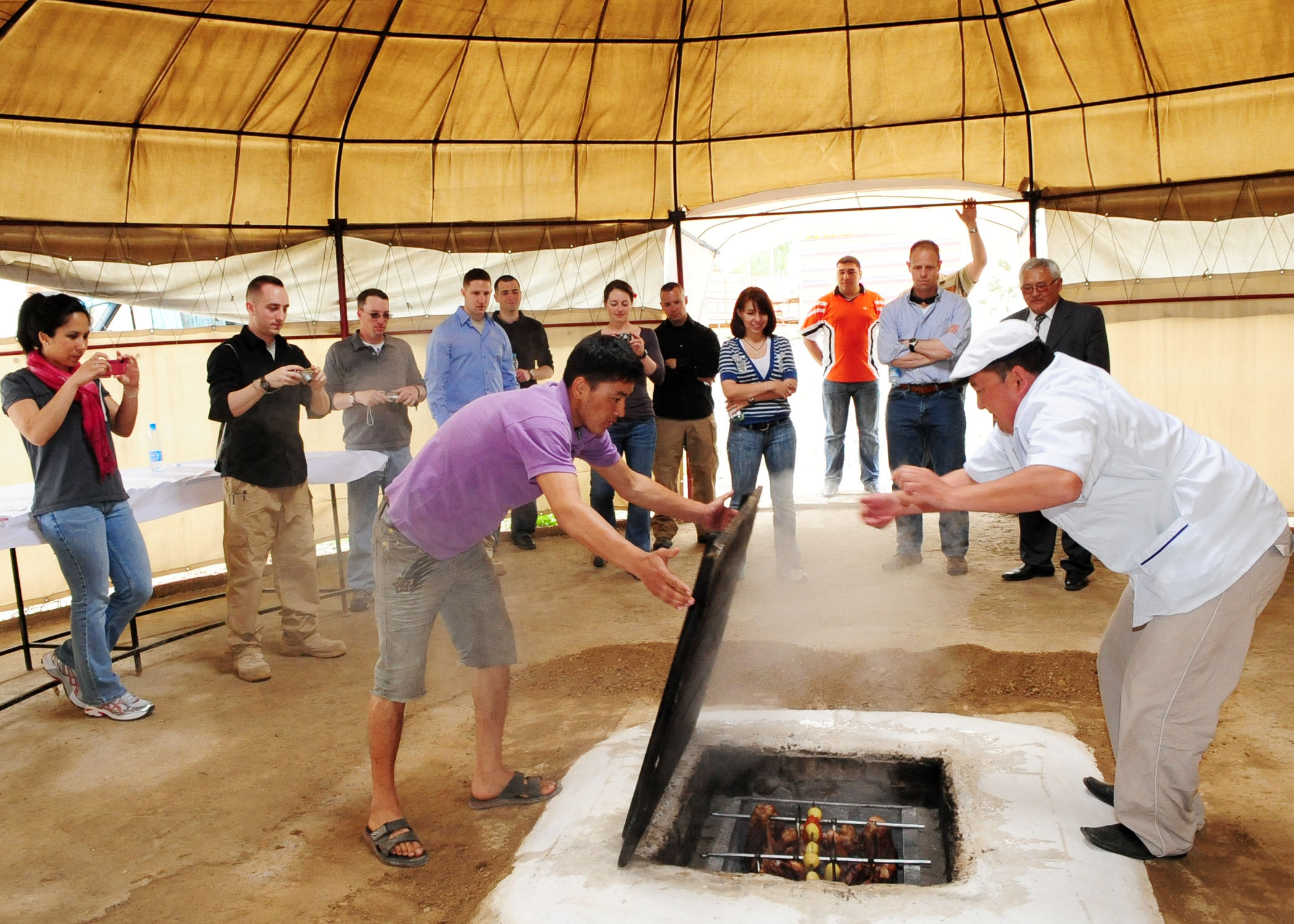 Airmen enjoy a traditional Kyrgyz hunter's BBQ
