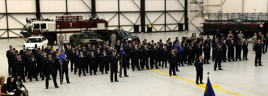 RAF MILDENHALL, England – A formation of members of the 100th Mission Support Group stand at parade rest during the group’s change of command ceremony May 7.  Individual flights represented each squadron in the mission support group in hanger 814. (U.S. Air Force photo/ Staff Sgt. Jerry Fleshman)