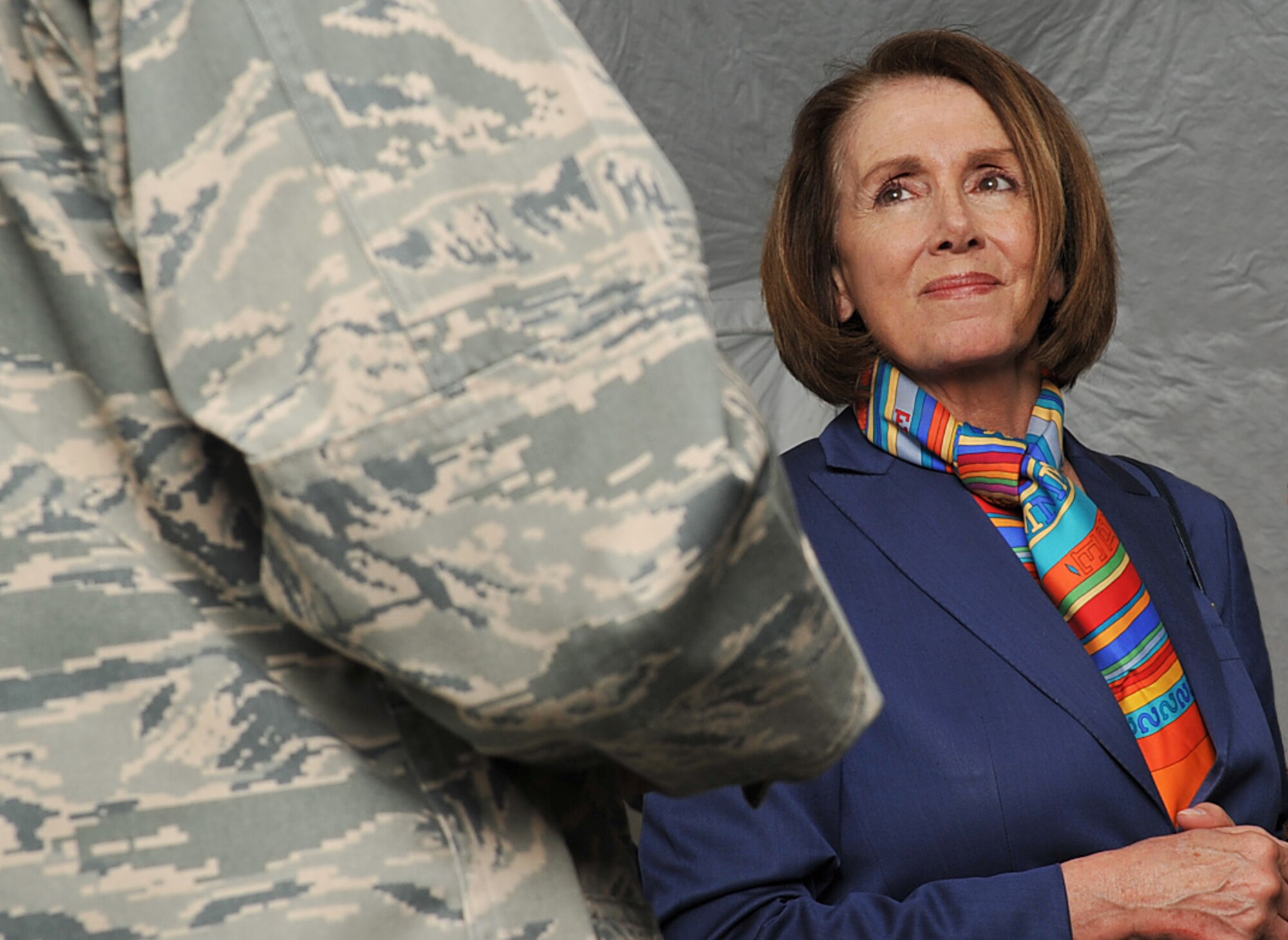 Nancy Pelosi, Speaker of the U.S. House of Representatives, is briefed by a U.S. Air Force member of the 435th Air and Ground Operations Wing during a facilities tour, Ramstein Air Base, Germany, May 10, 2010. The briefing and tour were part of a Congressional Delegation which visited U.S. and Allied forces in the U.S. Central Command Area of Responsibility and in Germany. (U.S. Air Force photo by Senior Airman Tony R. Ritter) 
