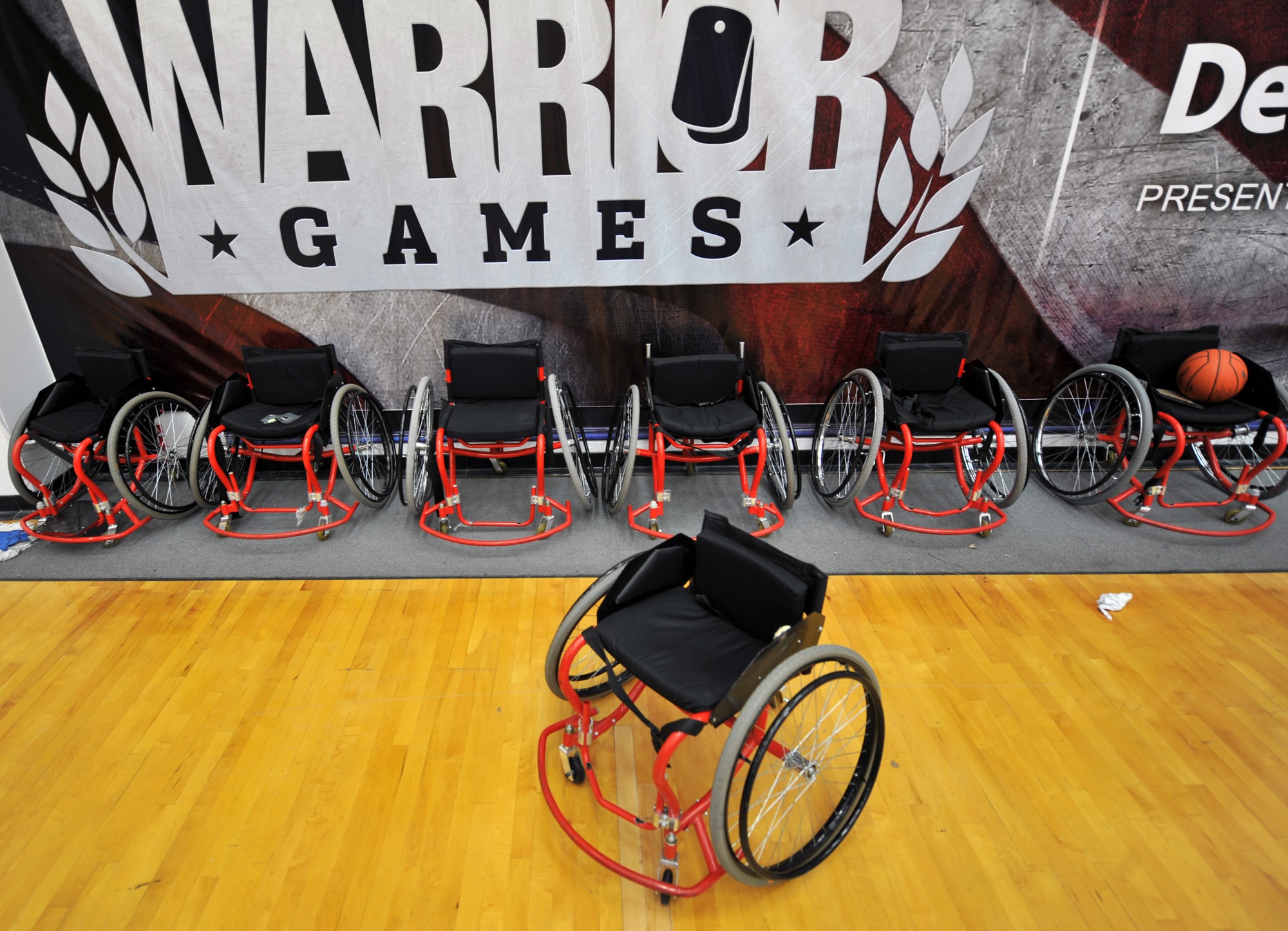 Wheelchairs are lined up against a wall in the basketball court May 10, 2010, at the Olympic Training Center in Colorado Springs, Colo.  Teams from the Air Force, Army, Navy, Marines and Coast Guard are participating in the inaugural Warrior Games which begin May 10 and finish May 14.  One of the competition events is wheelchair basketball.  (U.S. Air Force photo/Staff Sgt. Desiree N. Palacios)