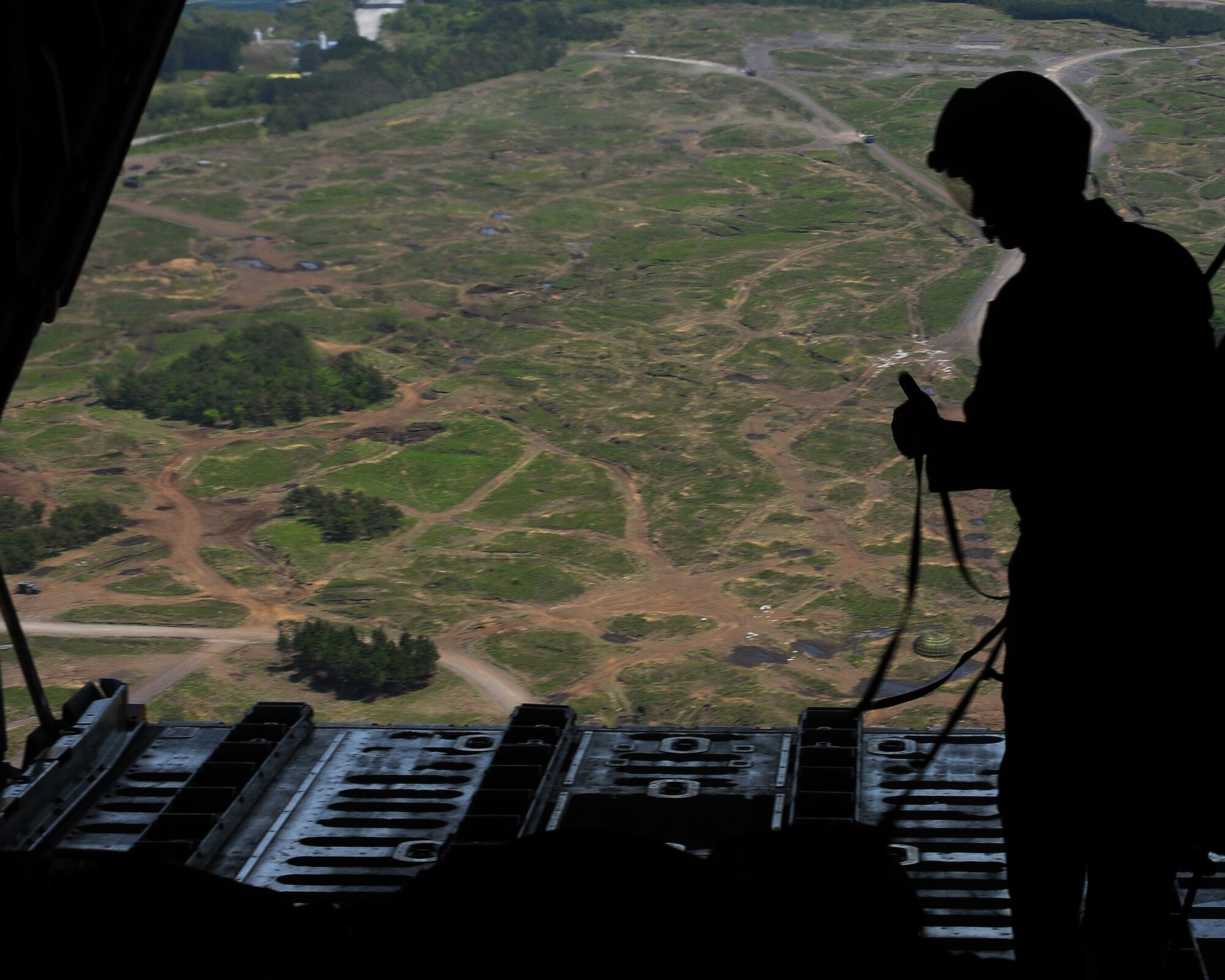 YOKOTA AIR BASE, Japan -- A loadmaster from the 374th Operations Support Squadron gives the "okay" May 5 during a Joint Air Delivery Inspection. The JAI event was a way for the Japan Air Self Defense Force to better understand how American loads are prepared and dropped. (U.S. Air Force photo/Airman 1st Class Sean Martin)