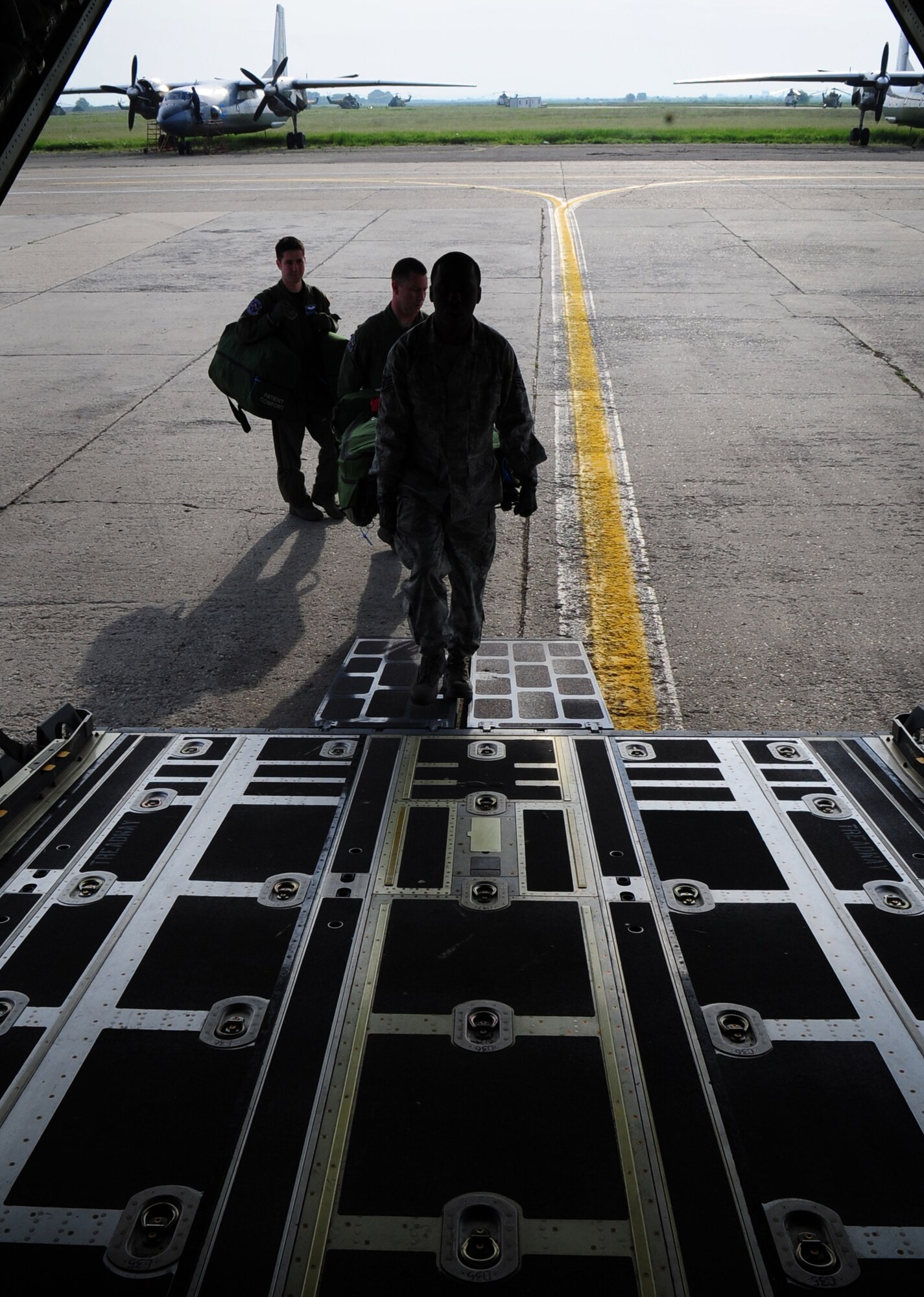 Members of the 86th Aeromedical Evacuation Squadron load medical equipment onto a C-130J in preparation for training and equipment familiarization with Romanian Air Force counterparts, during the joint exercise Carpathian Summer, Otopeni Airlift Base, Romania, May 12, 2010. Carpathian Summer 2010 was an exercise in which the Romanian Air Force invited members of the U.S. military to train with them on their soil and air space, to observe, firsthand, operations in action. This exercise was designed to build partnerships between these nations in an effort to work together more efficiently during real world scenarios. (U.S. Air Force Photo by Staff Sgt. Jocelyn Rich)