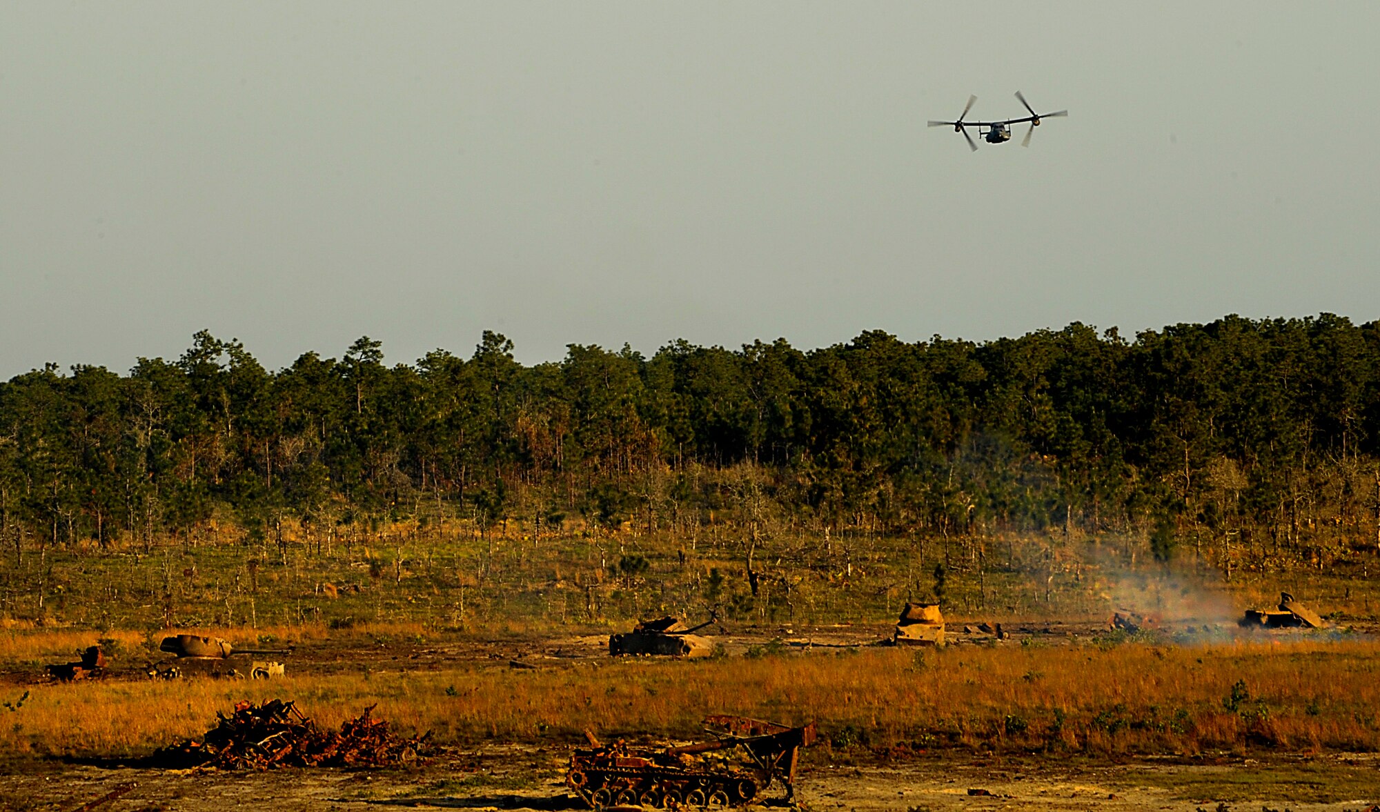 A U.S. Air Force CV-22 Osprey flys over the Eglin Air Force Range, Fla. The Osprey demonstrated some of its capabilities to participants of the Joint Civilian Orientation Course (JCOC). JCOC is a Secretary of Defense sponsored program, which gives civilian community leaders the opportunity to learn about the military and national defense. (U.S. Air Force photo by Master Sgt. Russell E. Cooley IV)(Released)
