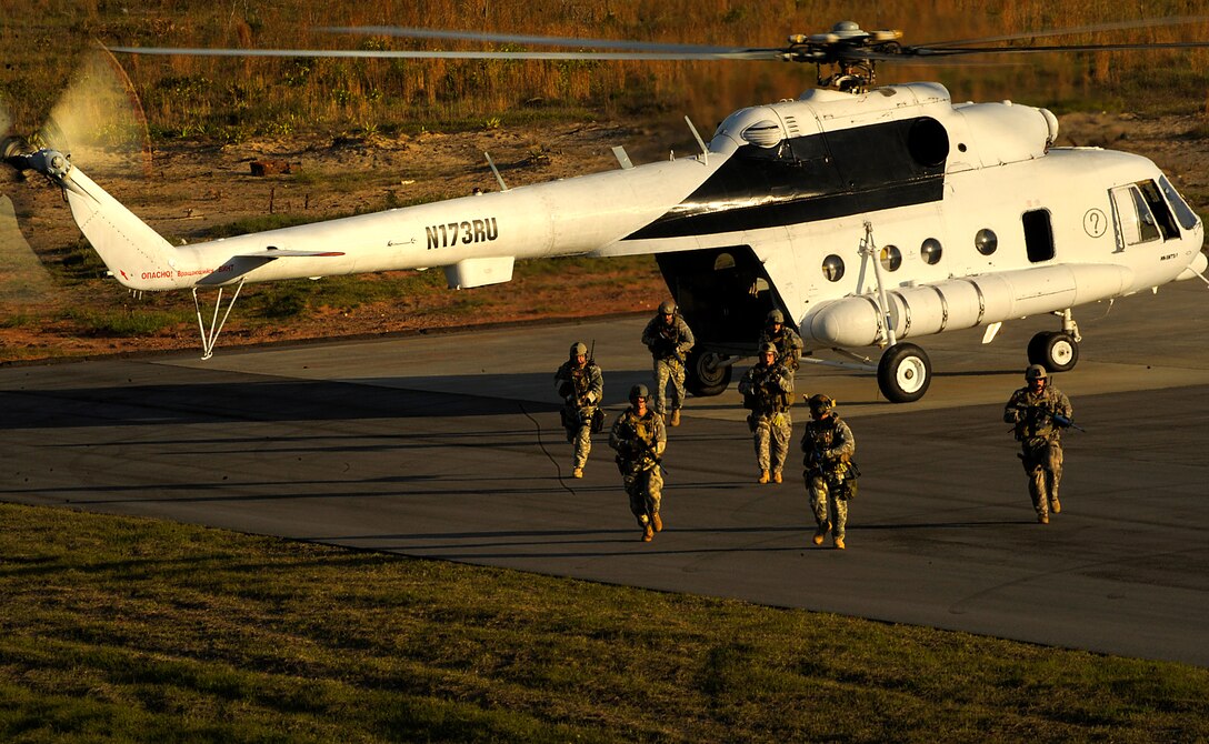 A Russian MI-17 used by the 6th Special Operations Squadron (SOS), Air Force Special Operation Command, Hurlburt Field, Fla., lands on the Eglin Air Force Range. The 6th SOS demonstrated some of its capabilities for participants of the Joint Civilian Orientation Course (JCOC). JCOC is a Secretary of Defense sponsored program, which gives civilian community leaders the opportunity to learn about the military and national defense. (U.S. Air Force photo by Master Sgt. Russell E. Cooley IV)(Released)
