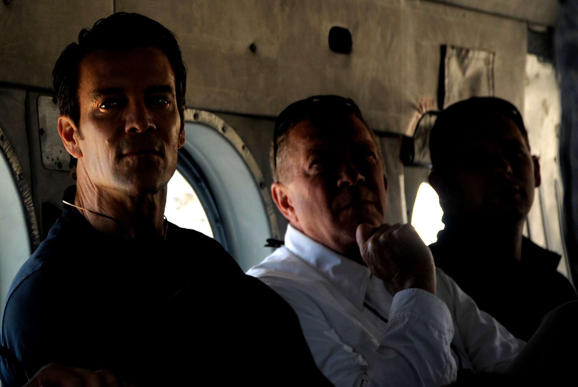 Participants of the Joint Civilian Orientation Course (JCOC) sit inside a MI-17 helicopter used by the 6th Special Operations Squadron, Air Force Special Operations Command, Hurlburt Field, Fla. on April 29, 2010. JCOC is a Secretary of Defense sponsored program, which gives civilian community leaders the opportunity to learn about the military and national defense. (U.S. Air Force photo by Master Sgt. Russell E. Cooley IV)(Released)