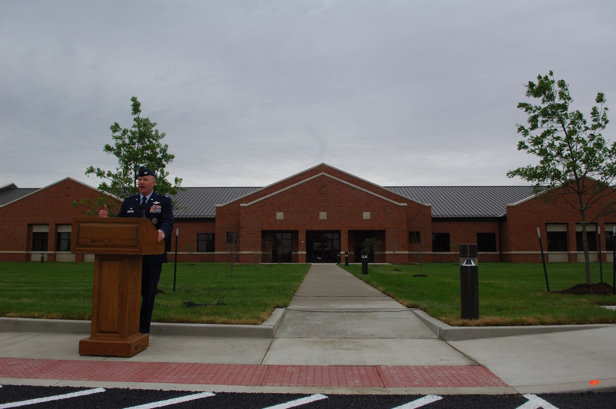 Col. Gary Goldstone, 375th Air Mobility Wing commander, welcomed the 375th and 126th Security Forces Squadrons to their new facility, the Base Defense Operations Center, Monday.  The new joint operations facility consolidates workspace for Security Forces personnel from several different buildings into one facility.(U.S. Air Force photo by Senior Airman Ryan Crane)
