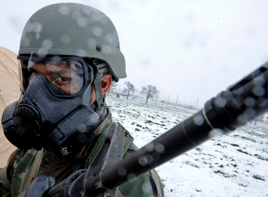 ELLSWORTH AIR FORCE BASE, S.D. — Tech Sgt. Correy Hodge, 28th Medical Group non commissioned officer in-charge of medical material,  stands guard at an entry control point during the Phase II Operational Readiness Exercise, May 12. The Phase II ORE will test Airmen across the base on their ability to operate in a deployed environment. (U.S. Air Force photo/Senior Airman Adam Grant)