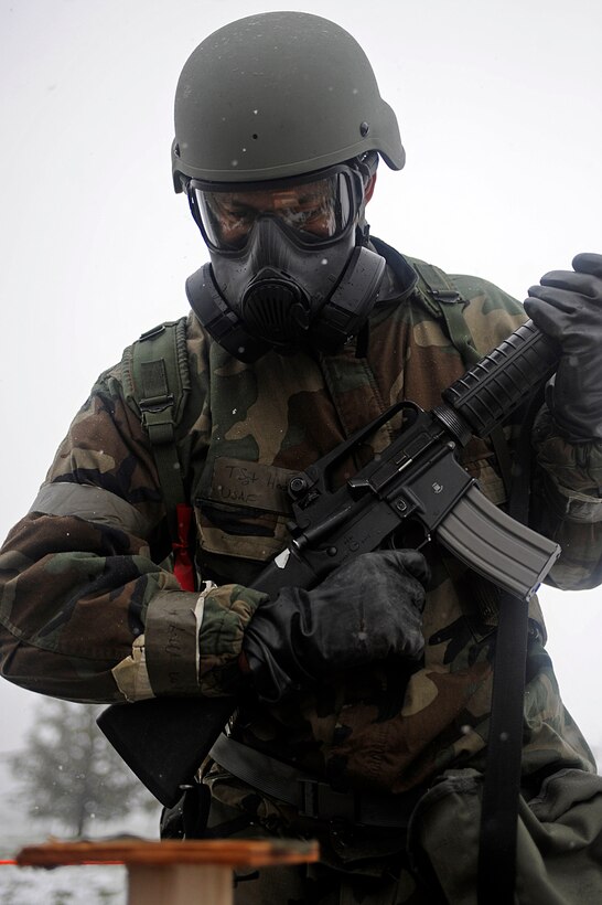 Tech. Sgt. Correy Hodge, 28th Medical Support Squadron medical material NCO in-charge, checks an M-8 stand during a Phase II operational readiness exercise, May 12. The stand is used to detect airborne contaminates. (U.S. Air Force photo/Airman 1st Class Matthew Flynn)