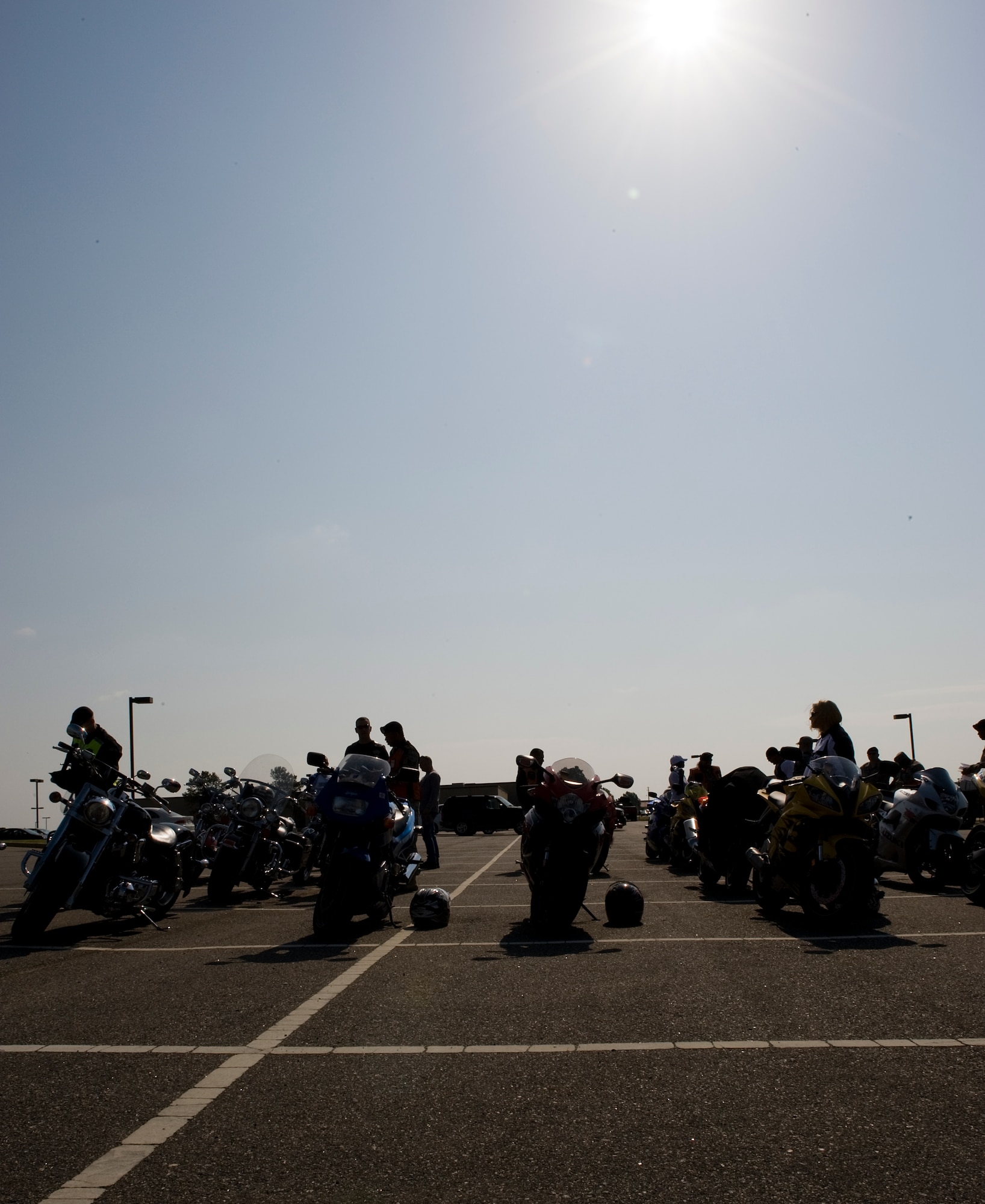 LANGLEY AIR FORCE BASE, Va. -- Members participating in the motorcycle ride prepare their motorcycles May 12.  The motorcycle ride was part of National Police Week, a celebration in honor of law enforcement officers who lost their lives in the line of duty. (U.S. Air Force photo/Senior Airman Zachary Wolf)
