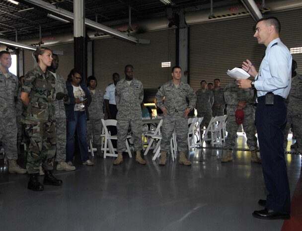 Lt. Col. Richard Sanders speaks to Airmen from the 628th Civil Engineer Squadron about Wingman Stand Down Day to help prevent suicides and private motor vehicle accidents at the Gaylor Dining Facility on Joint Base Charleston, S.C., May, 10, 2010. The stand down day was ordered by the Air Force Chief of Staff Gen. Norton Schwartz to halt the rising number of Airmen who are dying in reckless accidents or suicides. This year alone, 19 Airmen have committed suicide and are making it the second leading cause of death in the Air Force. (U.S. Air Force Photo/Airman 1st Class Lauren Main)