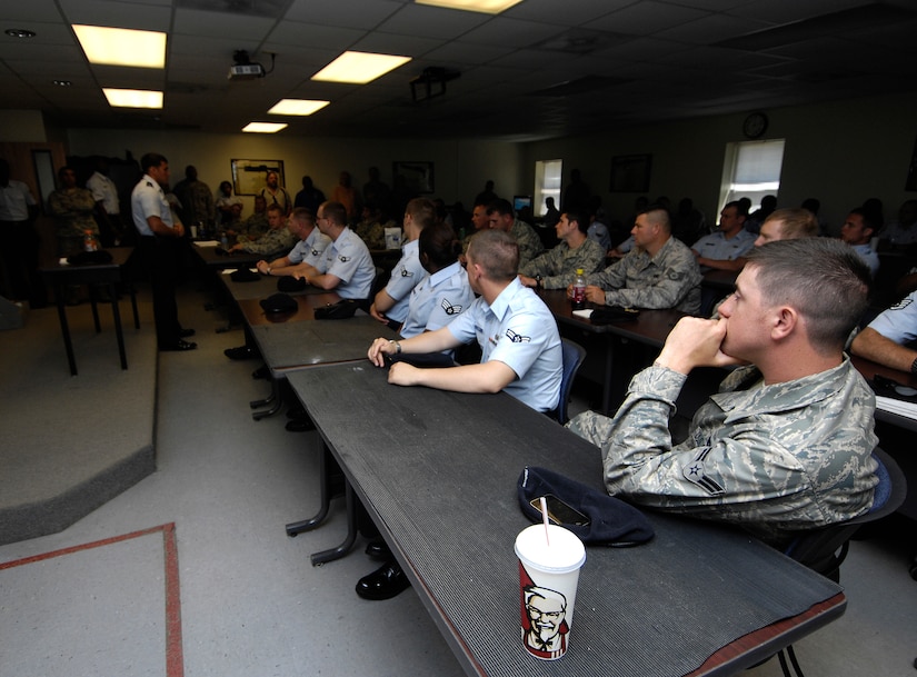 Airmen from the 628th Security Forces Squadron attend Wingman Stand Down Day to help prevent suicides and private motor vehicle accidents at the Gaylor Dining Facility on Joint Base Charleston, S.C., May, 10, 2010. The stand down day was ordered by the Air Force Chief of Staff Gen. Norton Schwartz to halt the rising number of Airmen who are dying in reckless accidents or suicides. Common indicators for individuals contemplating suicide are a shift in personality, giving away possessions and with drawl from every day activities. (U.S. Air Force Photo/Airman 1st Class Lauren Main)