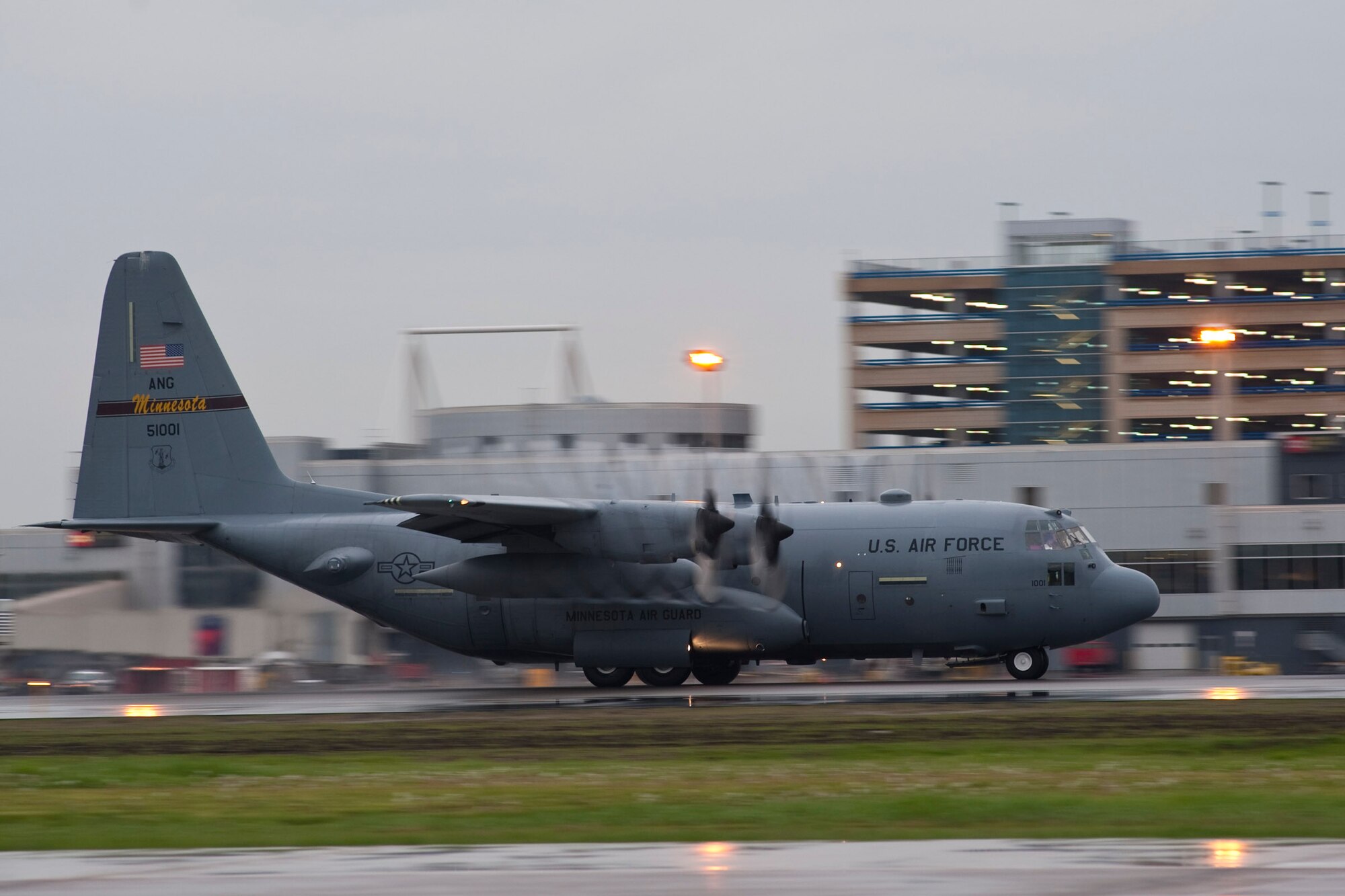 A 133rd Airlift Wing C-130 Hercules screams down the runway with water streaming off the props during takeoff for Southwest  Asia 6 May, 2010. Airmen from the Minnesota Air National Guard 133rd Airlift Wing are deploying with the Herc to Southwest Asia in support of Operation Enduring Freedom. U.S. Air Force photo by Tech. Sgt. Erik Gudmundson(released)