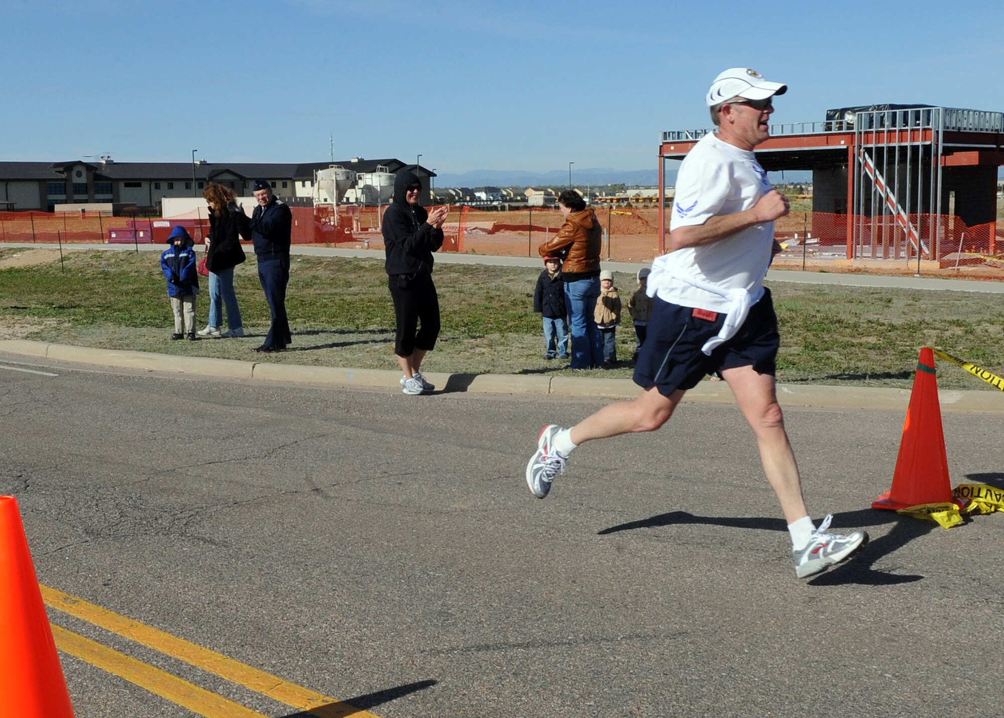 BUCKLEY AIR FORCE BASE, Colo. -- Quintin Walline finishes second during the Fourth Annual Half Marathon. ( U.S. Air Force Photo by Airman 1st Class Marcy Glass )