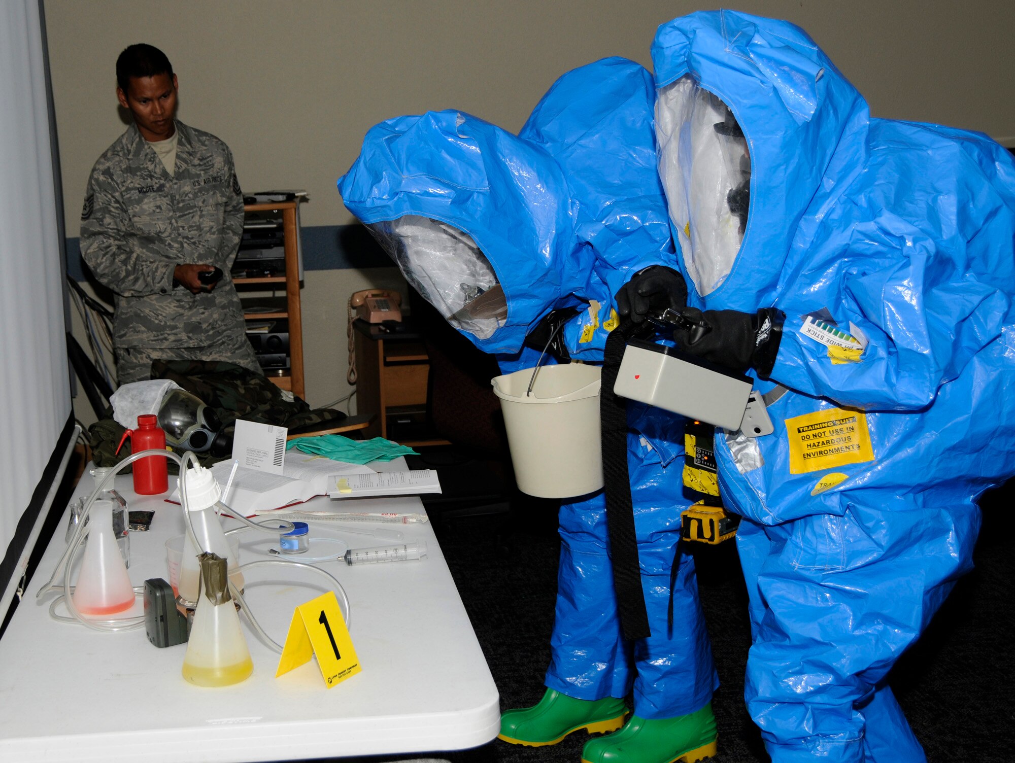 Members of the Air National Guard Chemical, Biological, Radiological and Nuclear (CBRNE) Challenge Team conduct an exercise scenario at the 188th Fighter Wing April 28, 2010, in preparation for this week's Air Force-wide CBRNE competition held at the Center of National Response in West Virginia. (U.S. Air Force photo by Senior Master Sgt. Dennis Brambl/188th Fighter Wing Public Affairs) 