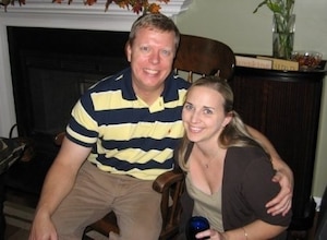 LANGLEY AIR FORCE BASE, Va. -- Holly Snyder poses with her husband, Maj. Brian Snyder, Air Combat Command A8 directorate of requirements executive officer. Holly is a certified genetic counselor at Eastern Virginia Medical School, where she cares for hundreds of patients and serves as a patient advocate and a genetic resource to physicians. (Courtesy photo)