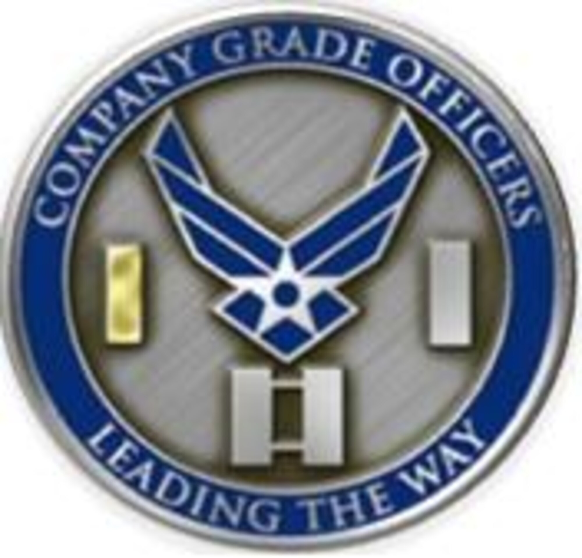 Pictured is the newly designed Company Grade Officer Association coin for the 319th Air Refueling Wing at Grand Forks Air Force Base, N.D. CGOA representatives presented their first newly designed coin to Gen. Raymond E. Johns, Jr., commander of Air Mobility Command, when he visited Grand Forks AFB this past February. (U.S. Air Force art)