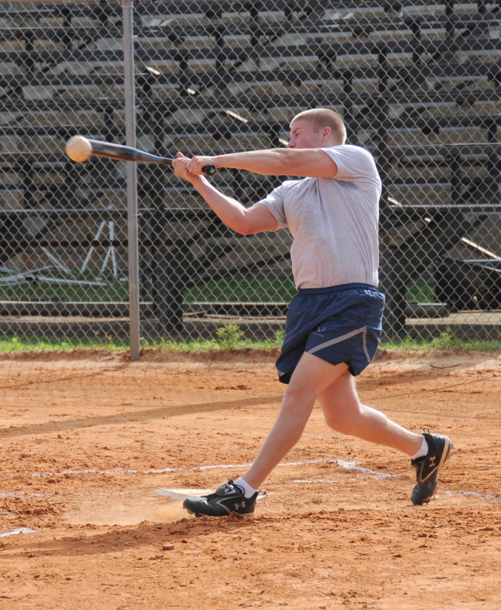Ryan Kamplain, 81st Logistics Readiness Squadron, connects for a solid hit in a softball game during Sports Day, May 7.  The 81st LRS beat the 336th Training Squadron, 16-12.  (U.S. Air Force photo by Kemberly Groue)