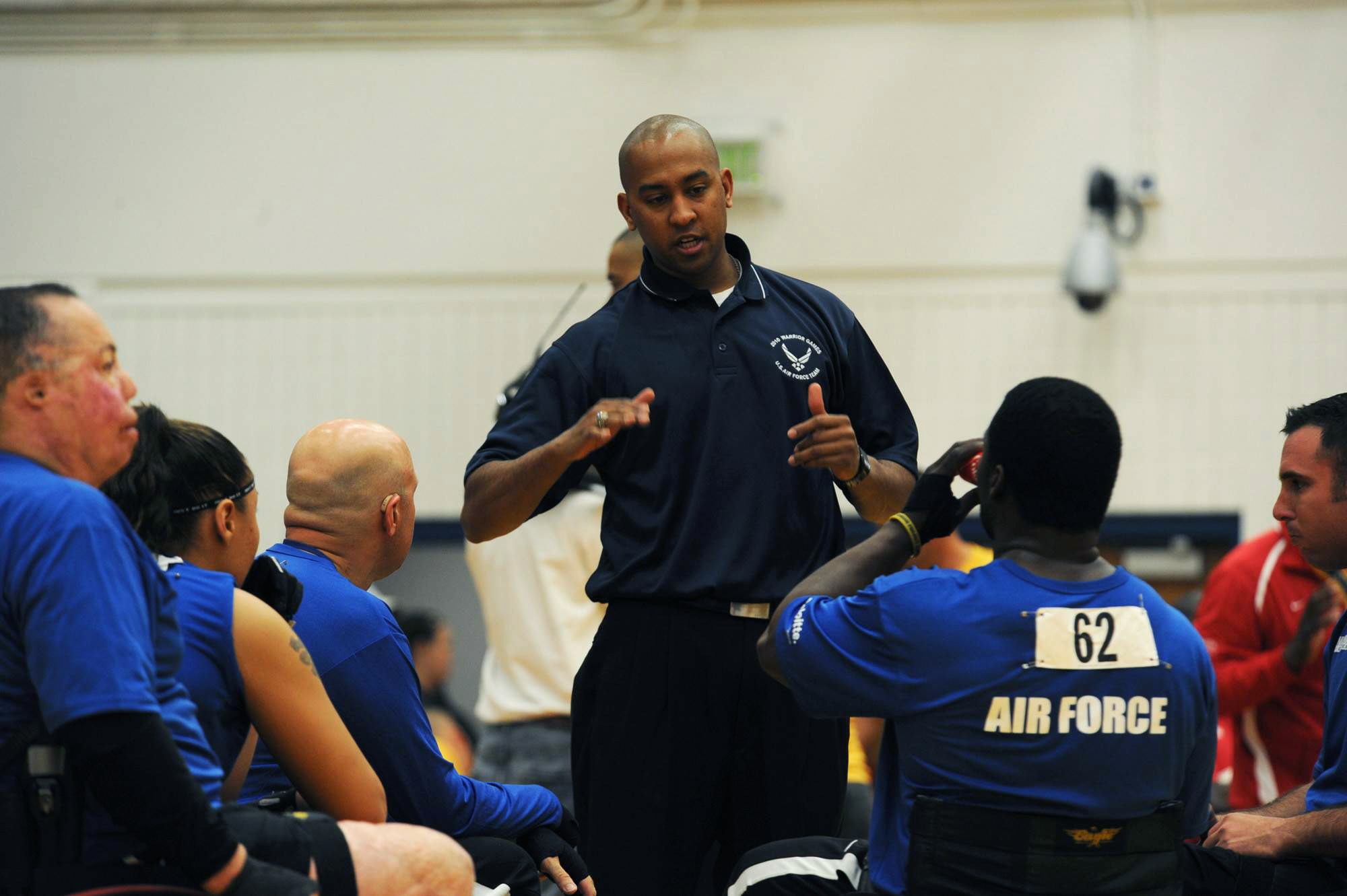 1st. Lt. Dan Taylor, Air Force wheelchair basketball coach, talks strategy with his team May 11, 2010, during the first game of the Warrior Games wheelchair basketball competition. The Warrior Games began May 10 and finish on May 14 and are taking place at the U.S. Olympic Training Center in Colorado Springs, Colo. (U.S. Air Force photo/Staff Sgt. Desiree N. Palacios)