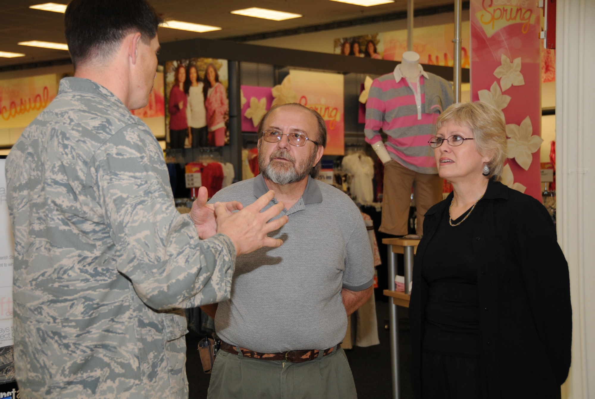 From left, Brig. Gen. Ian Dickinson, 81st Training Wing commander, chats with the Geistfelds about their vacation plans May 5 at the base exchange.  (U.S. Air Force photo by Kemberly Groue)