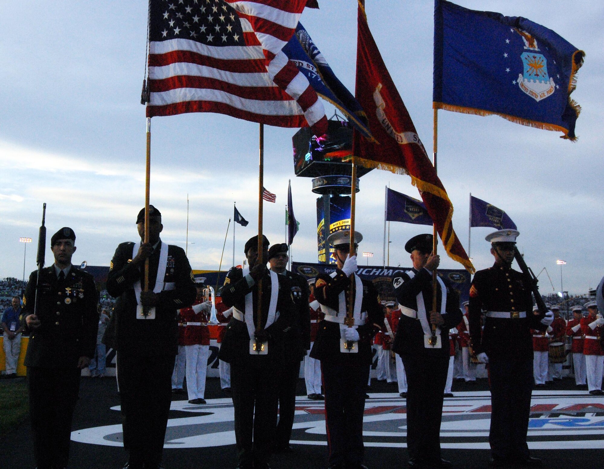 The Joint Color Guard Team from Fort Lee, Va., represented the military services during the opening ceremony at the NASCAR Crown Royal 400 at the Richmond International Raceway May 1, 2010.  Master Sgt. Thomas Bender (second from the right), 364th Training Squadron water and fuels quality course instructor, was selected to carry the Air Force flag.  (U.S. Air Force/courtesy photo)