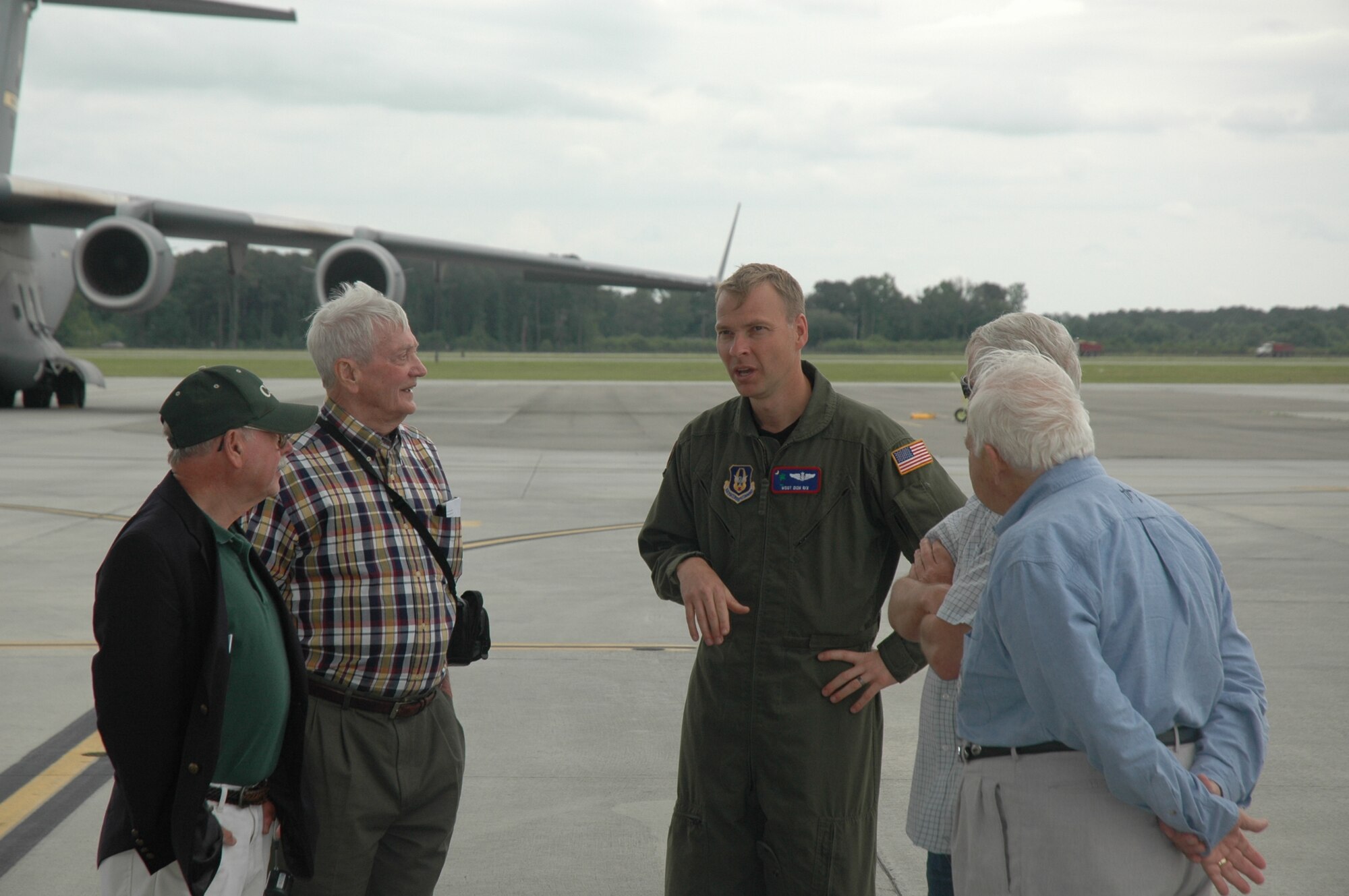 Msgt Don Rix answers some questions about the plane during the St. Johns Mens Group tour.