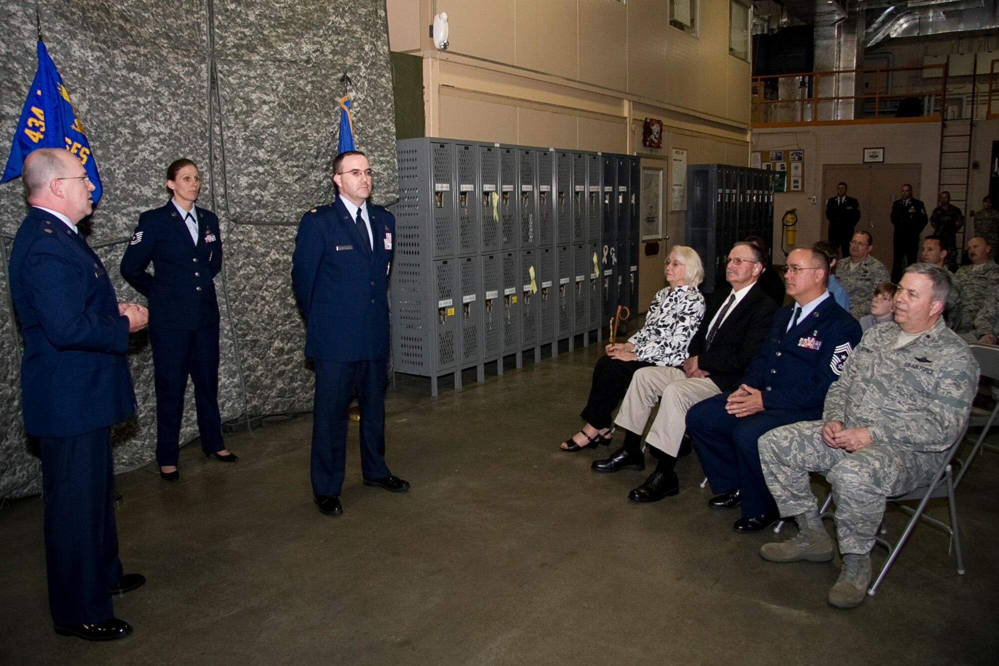 GRISSOM AIR RESERVE BASE, Ind. -- Lt. Col. Daniel Harrison gives opening remarks to the audience assembled to witness Maj. Christopher Witter assume command of the 434th Security Forces Squadron commander during the May unit training assembly. Colonel Harrison, who is the 434th Mission Support Flight commander, was the officiating officer of the ceremony. (U.S. Air Force photo/Tech. Sgt. Mark R. W. Orders-Woempner)