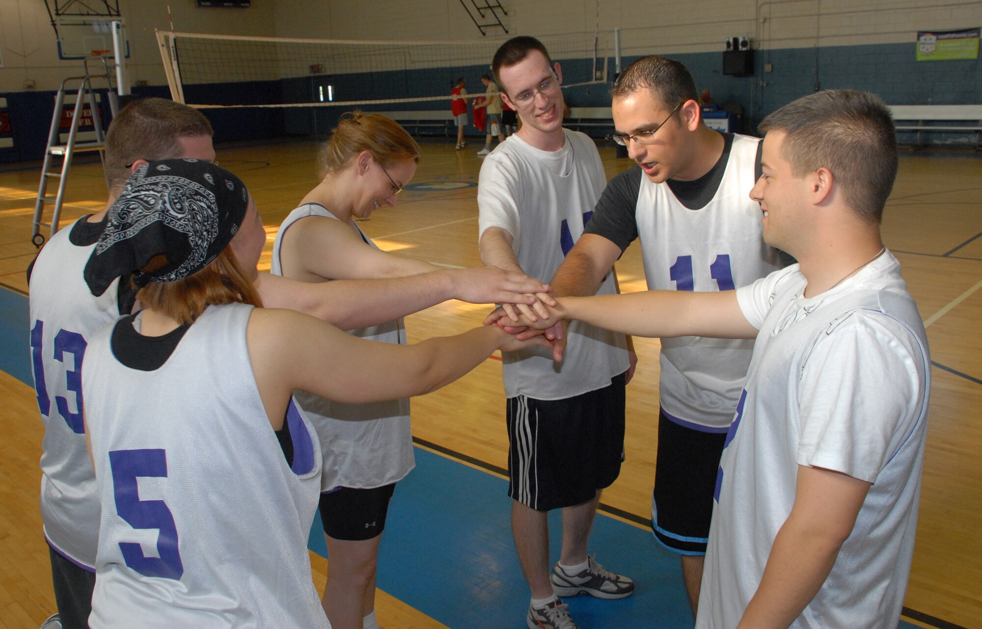 The 436th Maintenance Operations Squadron team huddles together with a game plan before their volleyball match May 4 at the Fitness Center. (U.S. Air Force photo/Airman 1st Class Shen-Chia Chu)