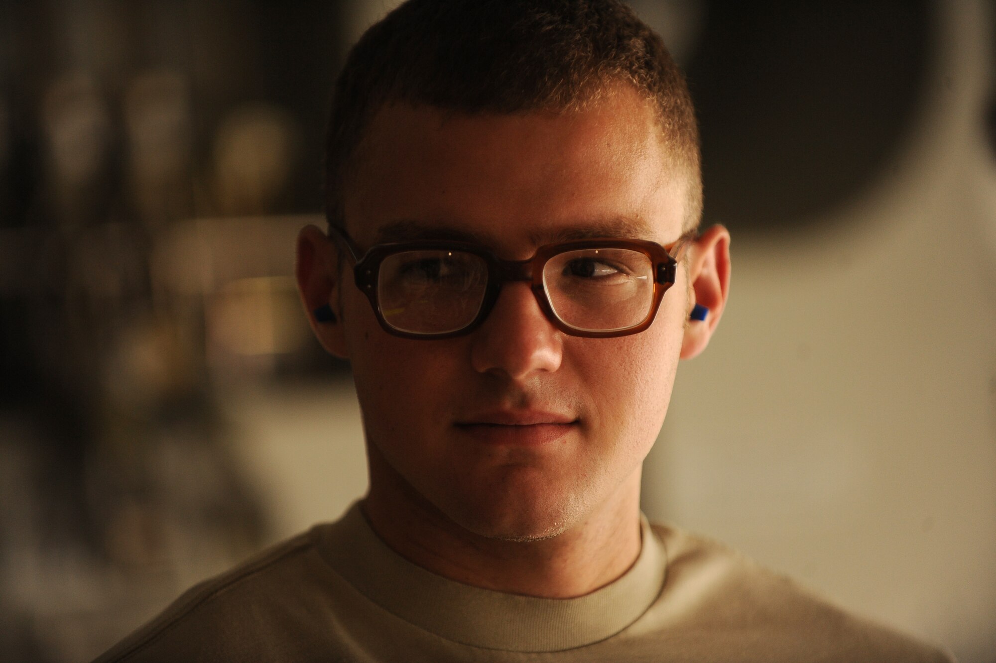 Senior Airman Curtis Whited, an aerial porter assigned to 451st Expeditionary Logistics Readiness Squadron's Detachment 1, waits for the arrival of cargo to be transported aboard a C-17, April 20, 2010, at Camp Bastion, Afghanistan. (U.S. Air Force photo/Staff Sgt. Manuel J. Martinez/released)