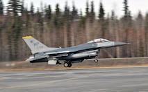 An F-16 Fighting Falcon pilot with the 80th Fighter Squadron, Kunsan Air Base, Republic of Korea, takes off from Eielson Air Force Base, Alaska, for a mission during Red Flag-Alaska April 16. Red Flag-Alaska is a field training exercise that provides joint offensive counter-air, interdiction, close air support, and large force employment training in a simulated combat environment. (U.S. Air Force photo/Capt. Shannon Collins)