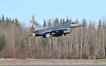 1st Lt. Jondavid Hertzel, 80th Fighter Squadron F-16 Fighting Falcon pilot, takes off to participate in a Red Flag-Alaska mission at Eielson Air Force Base, Alaska, April 21. Lieutenant Hertzel is deployed from the 8th Fighter Wing, Kunsan Air Base, Republic of Korea. Red Flag-Alaska is a 10-day field training exercise that provides joint offensive counter-air, interdiction, close air support and large force employment training in a simulated combat environment. (U.S. Air Force photo/Capt. Shannon Collins)