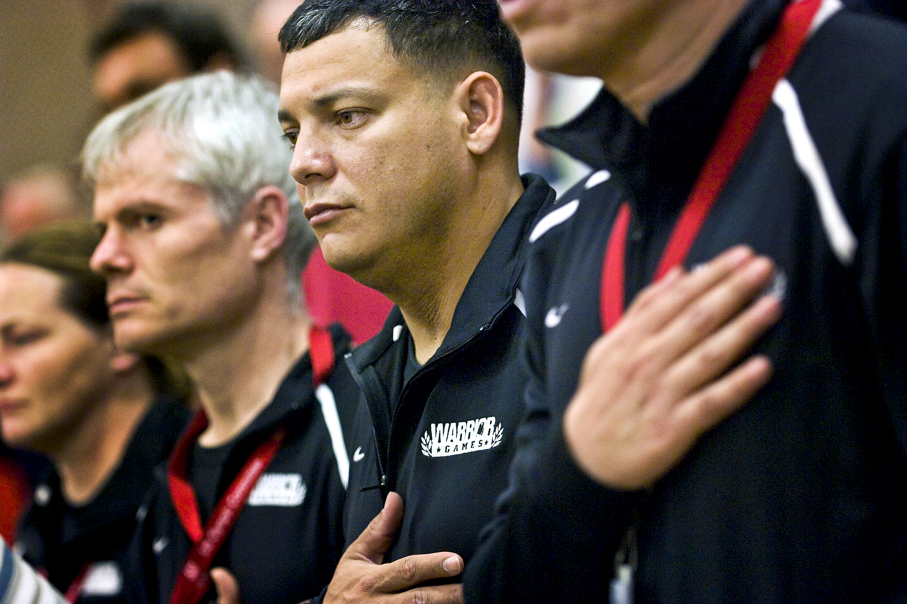U.S. Army Spc. Israel Laboy places his had over his heart during the ...