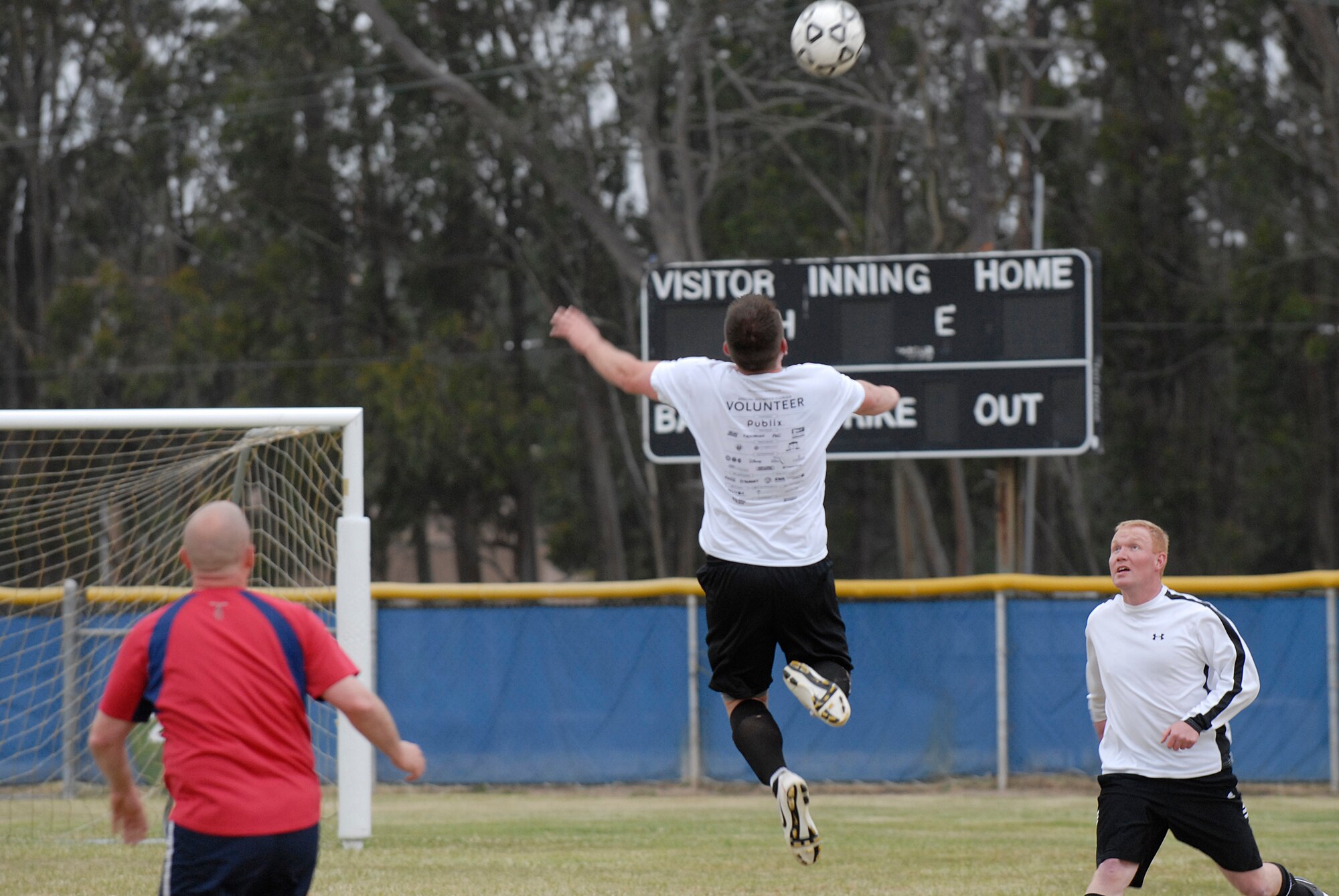 VANDENBERG AIR FORCE BASE, Calif. -- Will Davis, a 30th Launch Group team member, leaps to head butt the ball during an intramural soccer game at the base field here Wednesday, May 12, 2010.  The 30th Launch Group swept the game 9-0.  (U.S. Air Force photo/Senior Airman Andrew Satran) 

 
