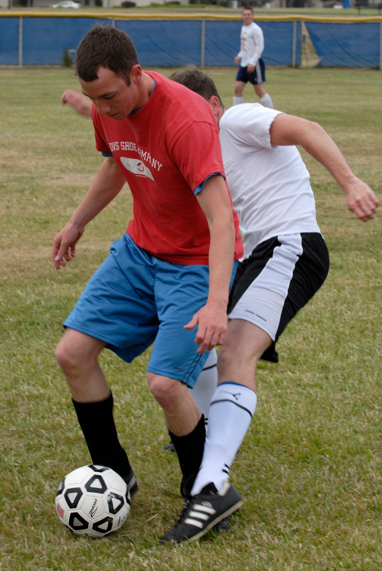 VANDENBERG AIR FORCE BASE, Calif. -- Protecting the ball, Brandon Satre, a 30th Space Communications Squadron team member, blocks a shot by Scott Carlin, a 30th Launch Group team member, during an intramural soccer game at the base field here Wednesday, May 12, 2010.  The 30th Launch Group scored three goals in the second half, which led to their win.  (U.S. Air Force photo/Senior Airman Andrew Satran) 

 


 

 
