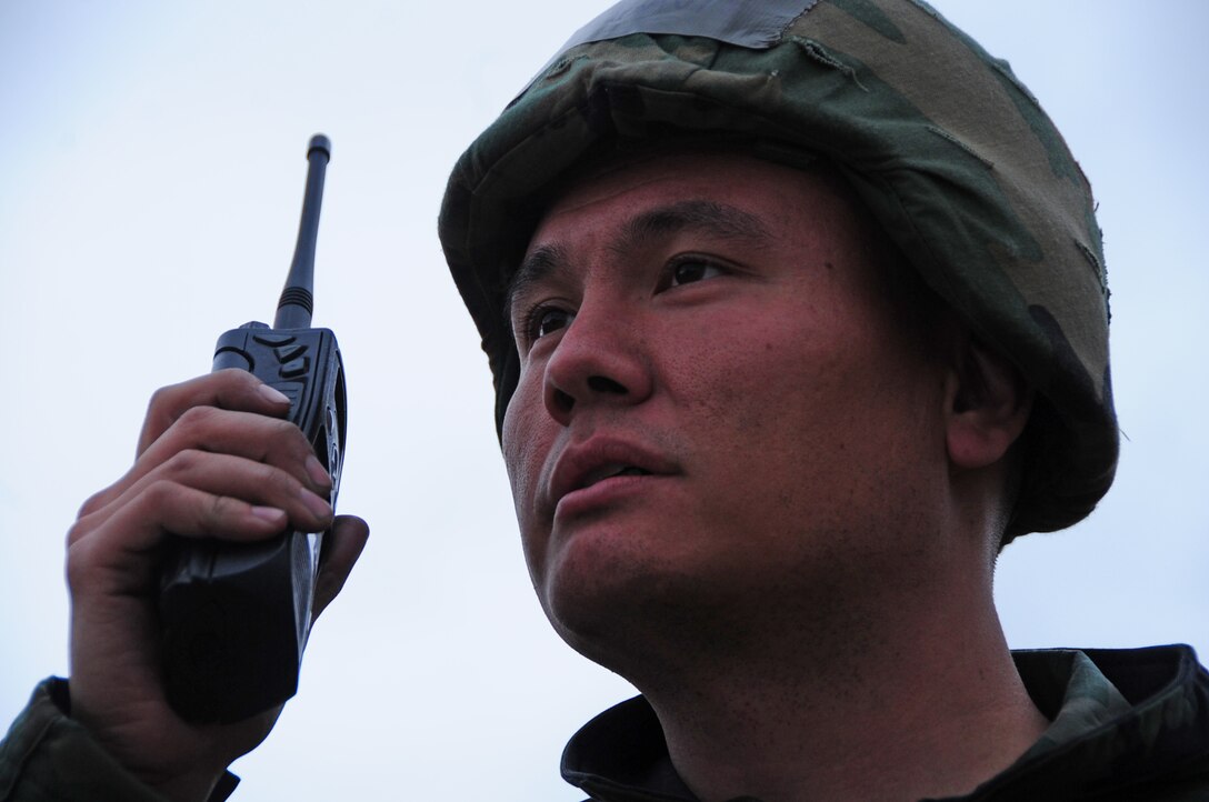 ELLSWORTH AIR FORCE BASE, S.D. – Tech. Sgt. Kevin David, 28th Medical Group NCO in-charge of resource management, uses a radio during a phase II Operational Readiness Exercise, May 11.  The Phase II ORE will test Airmen across the base on their ability to operate in a deployed environment. (U.S. Air Force photo/Airman 1st Class Anthony Sanchelli)
