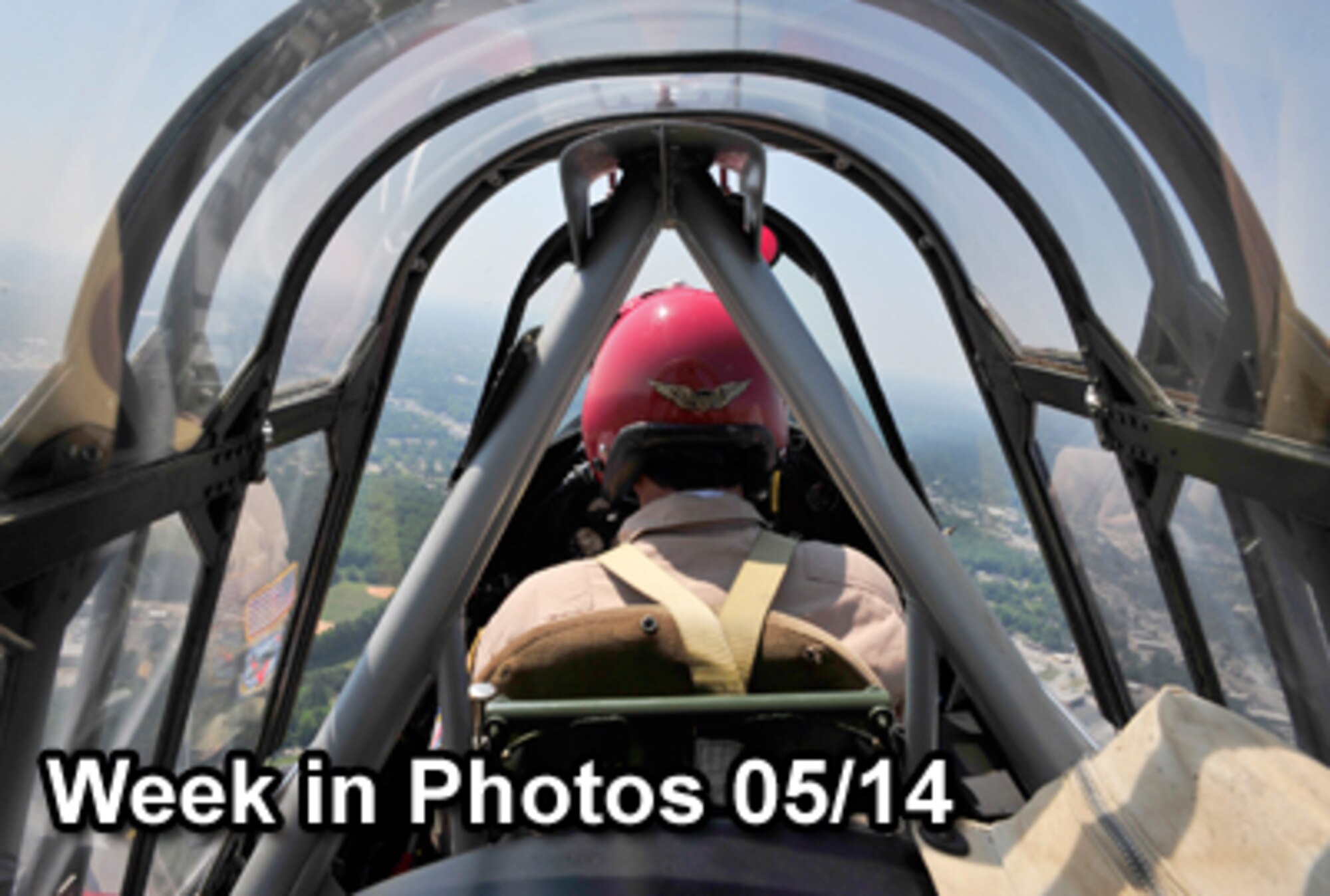 Air Force Week in Photos for May 14, 2010, highlights photos from around the Air Force. In this photo by Staff Sgt. Patrick Mitchell, an over-the-shoulder view of a pilot flying a T-6 Texan during ShawFest 2010 May 7, 2010, over Shaw Air Force Base, S. C. (U.S. Air Force photo illustration)
