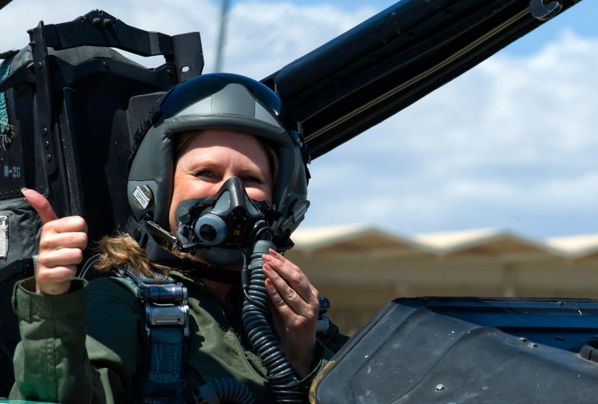 NELLIS AIR FORCE BASE, Nev. --   The Honorable Shari Buck, mayor of North Las Vegas, gives a "thumbs up" before her flight in a F-15E at Nellis May 12. (U.S. Air Force Photo by Airman 1st Class Brett Clashman)
