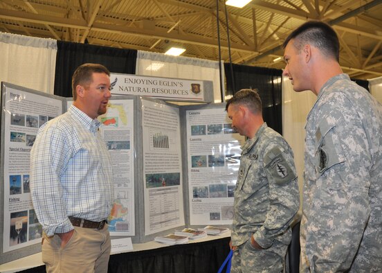 Justin Johnson, recreation coordinator for Jackson Guard, provided many 7th Special Forces Group soldiers information on recreational activities in the Eglin AFB local area May 12 at Fort Bragg, N.C.  Eglin and local area community representatives traveled to Fort Bragg to inform SFG soldiers on expectations of their  move to this area.  Over 1,500 soldiers and their families attended the third Town Hall meeting.  The town hall meetings were designed to address concerns including employment, education and housing.  (U.S. Air Force photo/Minty Knighton.)