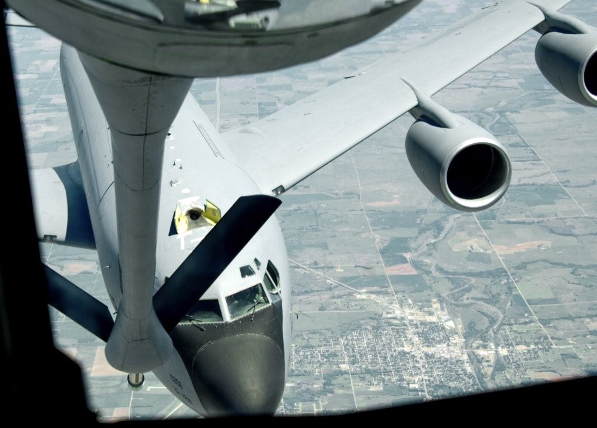 A KC-135 Stratotanker refuels another KC-135 during a refueling mission May 4, 2010. At the conclusion of a Mother's Day tribute, members of the American Gold Star Mothers, a national organization of mothers who have lost a son or daughter in the service of the country, participated in a refueling flight in a KC-135. (U.S. Air Force photo/Senior Airman Abigail Klein) 