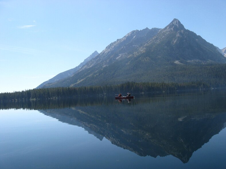 Canoeists enjoy a day on Leigh Lake in Teton National Park. Outdoor Recreation takes regular Kayaking/Canoe paddling trips in the spring and summer months. (U.S. Air Force courtesy photo)