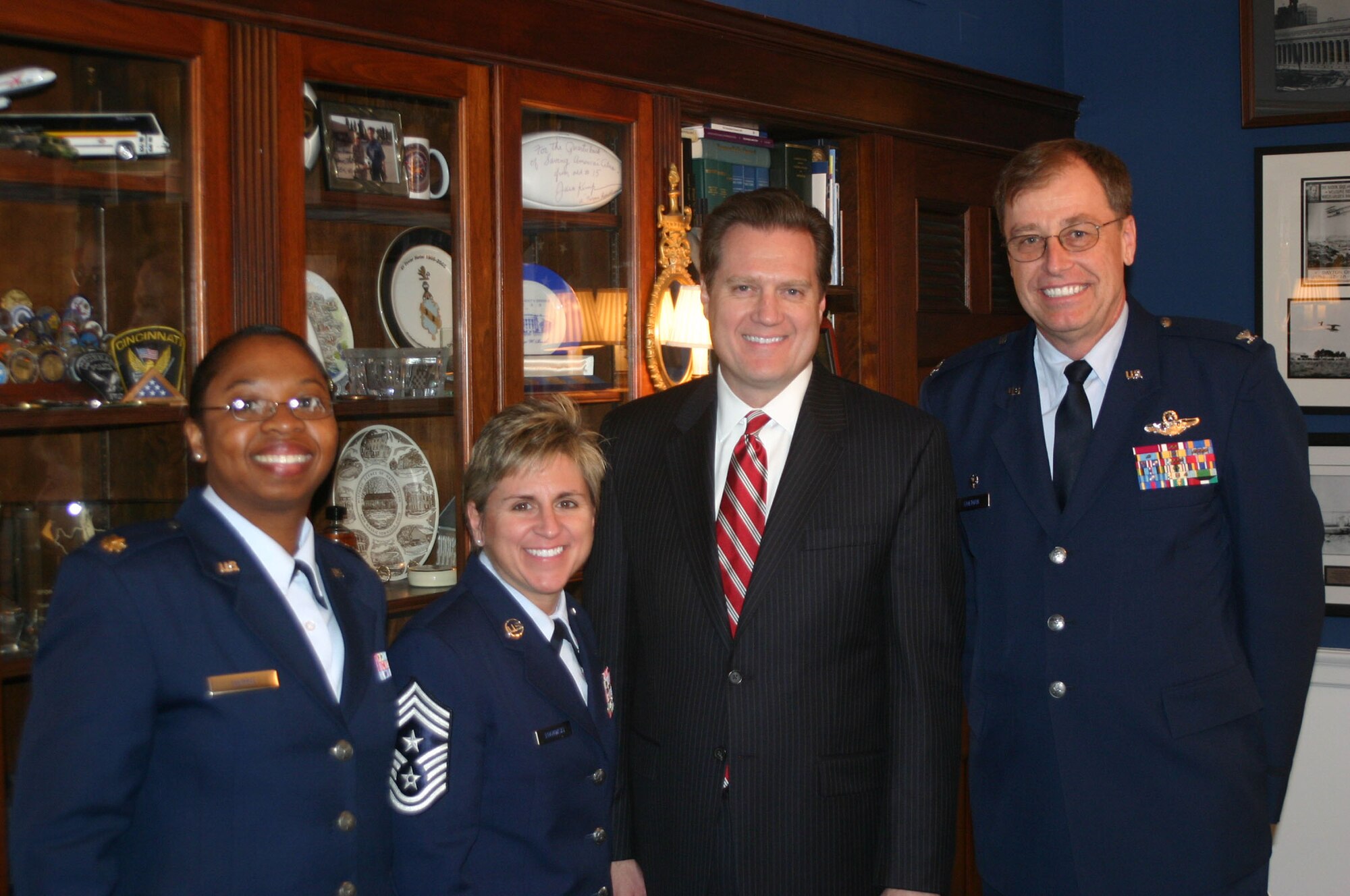 WRIGHT-PATTERSON AIR FORCE BASE, Ohio – From left to right; Maj. Cynthia Harris, 445th Airlift Wing Public Affairs; Chief Master Sgt. Peri Rogowski, 445th Airlift Wing command chief; Congressman Michael Turner, the Ohio 3rd District Representative to the United States Congress; and Col. Stephen Goeman, 445th Airlift Wing commander, met April 28 to discuss issues affecting the wing and Air Force Reserve Command.  445th AW wing leadership traveled to Capitol Hill and met with congressional leaders from Ohio, Kentucky and Indiana April 27-28 as part of the annual Commander Congressional visits. (Courtesy photo)
