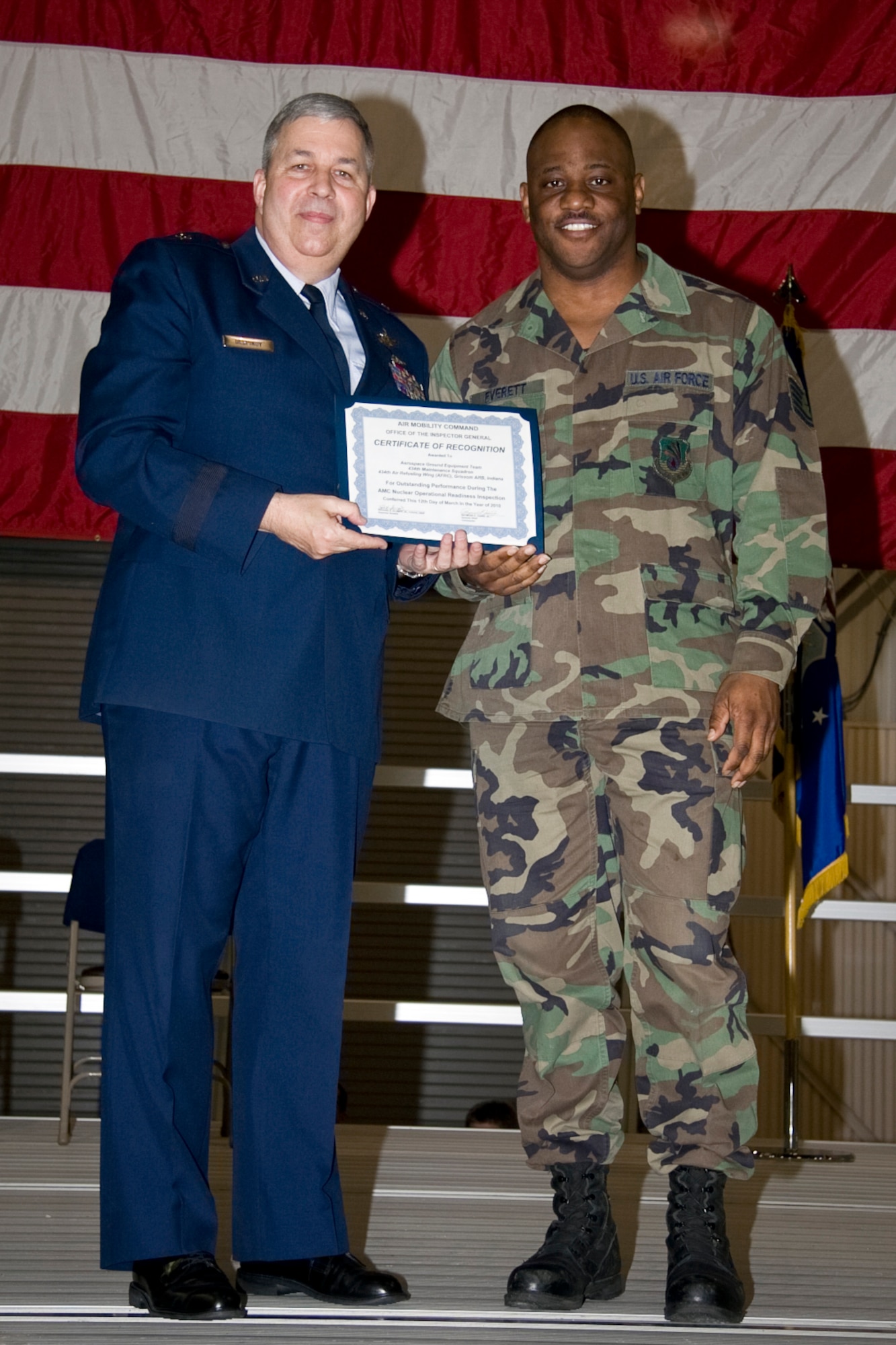 GRISSOM AIR RESERVE BASE, Ind. -- Tech. Sgt. Maurice Everett, 434th Maintenance Squadron aerospace ground equipment specialist, accepts an Air Mobility Command certificate of recognition for outstanding performance with an AGE team who participated in a nuclear operational readiness inspection recently. The certificate was presented by Brig. Gen. Dean Despinoy, 434th Air Refueling Wing commander, during a commander's call held in May. (U.S. Air Force photo/Tech. Sgt. Mark R. W. Orders-Woempner)