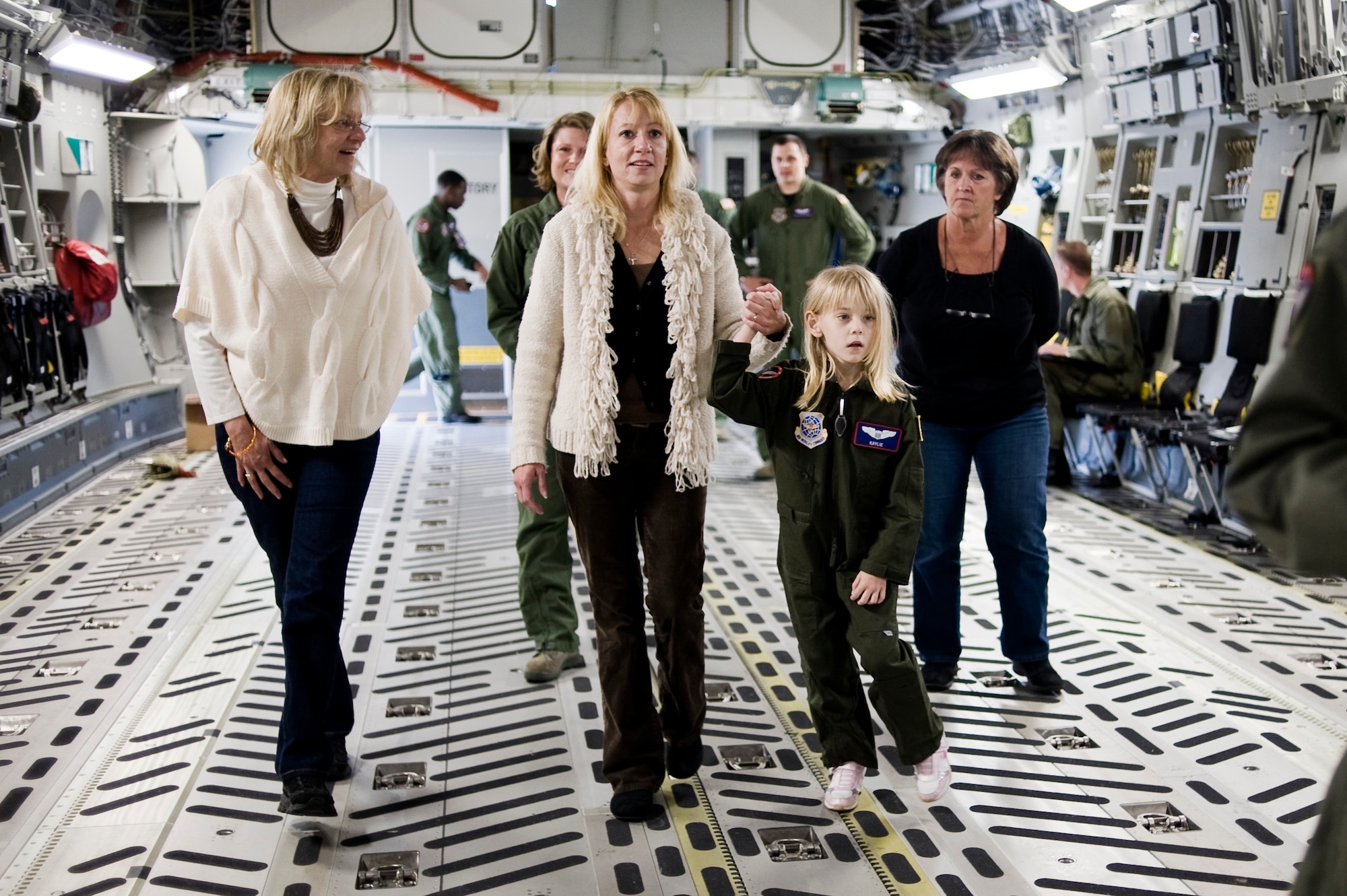 Pilot for a Day Kaylie Bergen, age 6, and her family tour a C-17 Globemaster III May 11 as part of McChord Field's Pilot for a Day program. (U.S. Air Force Photo by Abner Guzman)

