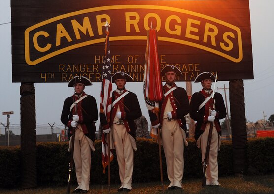 FORT BENNING, Ga. -- The 3rd U.S. Army Infantry Regiment (The Old Guard) from Washington, D.C., presents the American flag during the playing of the national anthem for the opening ceremony of the 27th annual David E. Grange Jr. Best Ranger Competition here May 7. The regiment's mission is to conduct memorial affairs to honor fallen comrades, as well as ceremonies and special events to represent the U.S. Army. (U.S. Air Force photo/Airman Class Joshua Green)