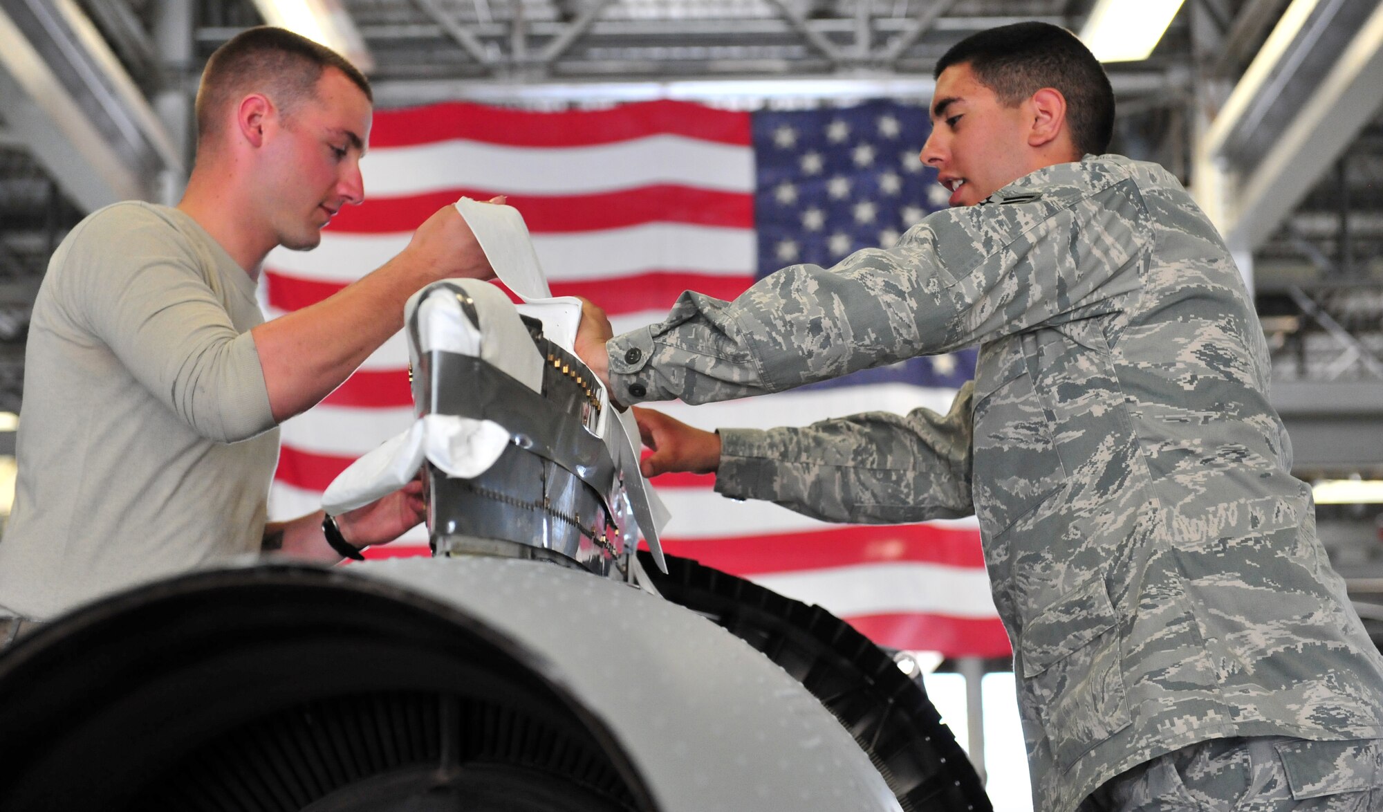 100510-F-6838W-036
SHAW AIR FORCE BASE, S.C. -- Airman 1st Adam Scully (left) and Airman Joseph Silva, both 20th Component Maintenance Squadron aerospace propulsion apprentices prepare the protective wrapping for the Turbo Fan 34 engine  May 10, 2010. The TF34 engine is the last one to be built at Shaw. (U.S. Air Force photo/Airman 1st Class Neil D. Warner)