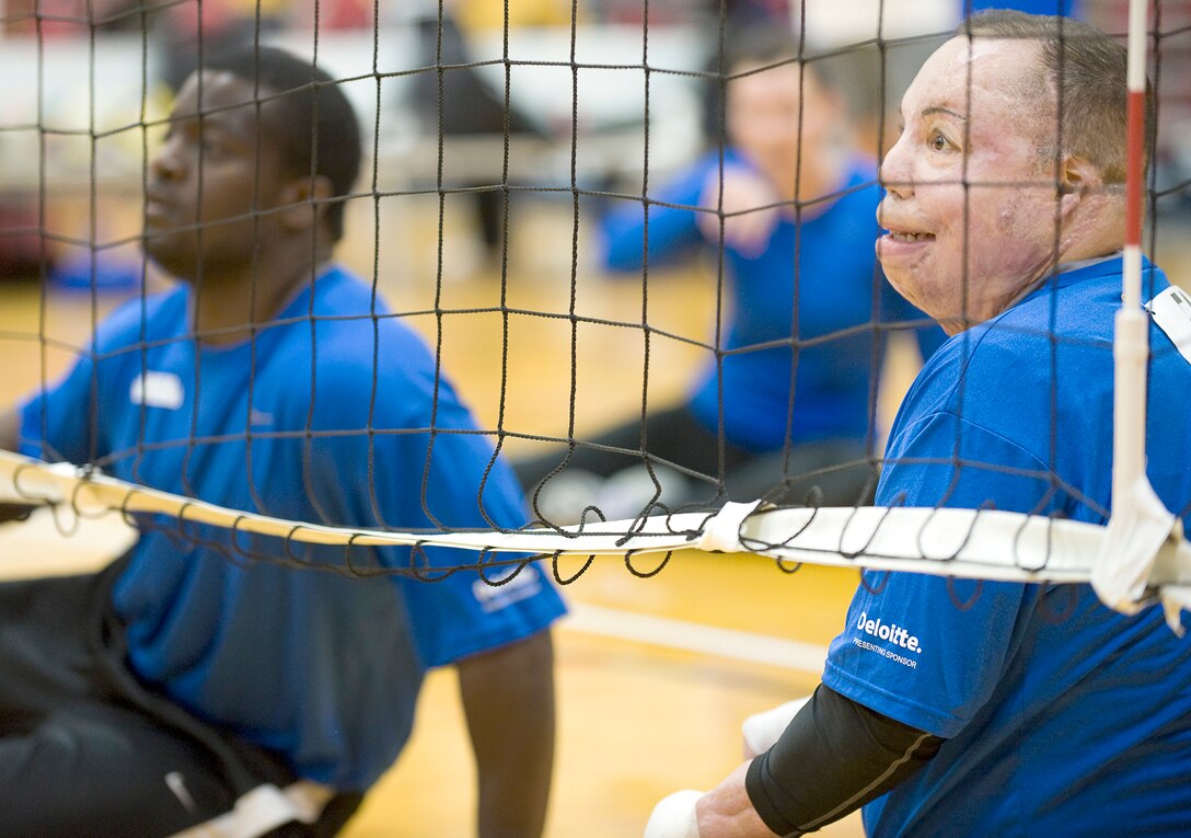 Staff Sgt. Elmer Sanders (left) and Tech. Sgt. Israel Del Toro wait for the Army team to serve the ball May 11, 2011 at the Olympic Training Center, Colorado Springs. The Air Force went on to win the game proceeding to the next round. The Warrior Games competition began May 10 and finishes on May 14, 2010 at the U.S. Olympic Training Center in Colorado Springs. (U.S. Air Force photo by Senior Airman Christopher Griffin)